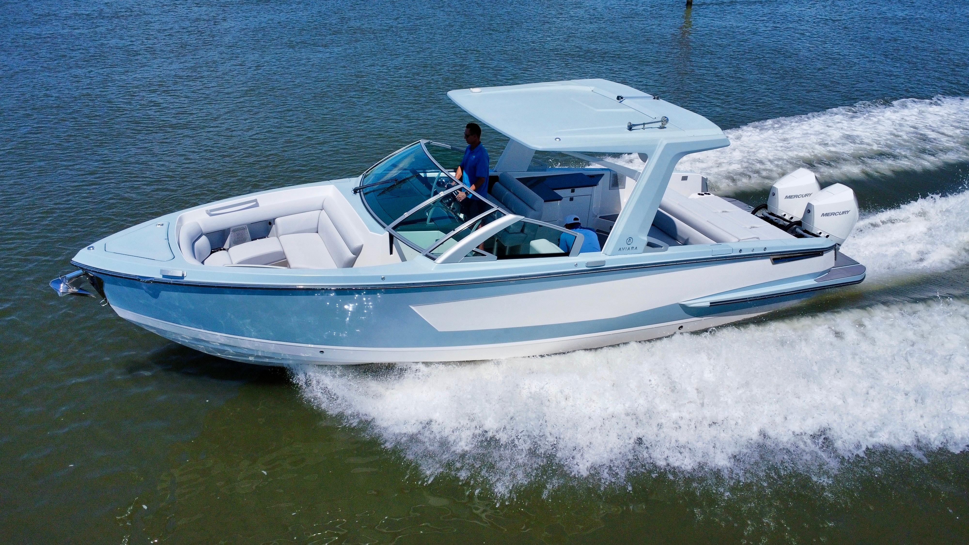 Aviara-AV32 OB 2021 -FL-US-2021 Aviara AV32 OB luxury motorboat cruising on water.-9443715 | Thumbnail