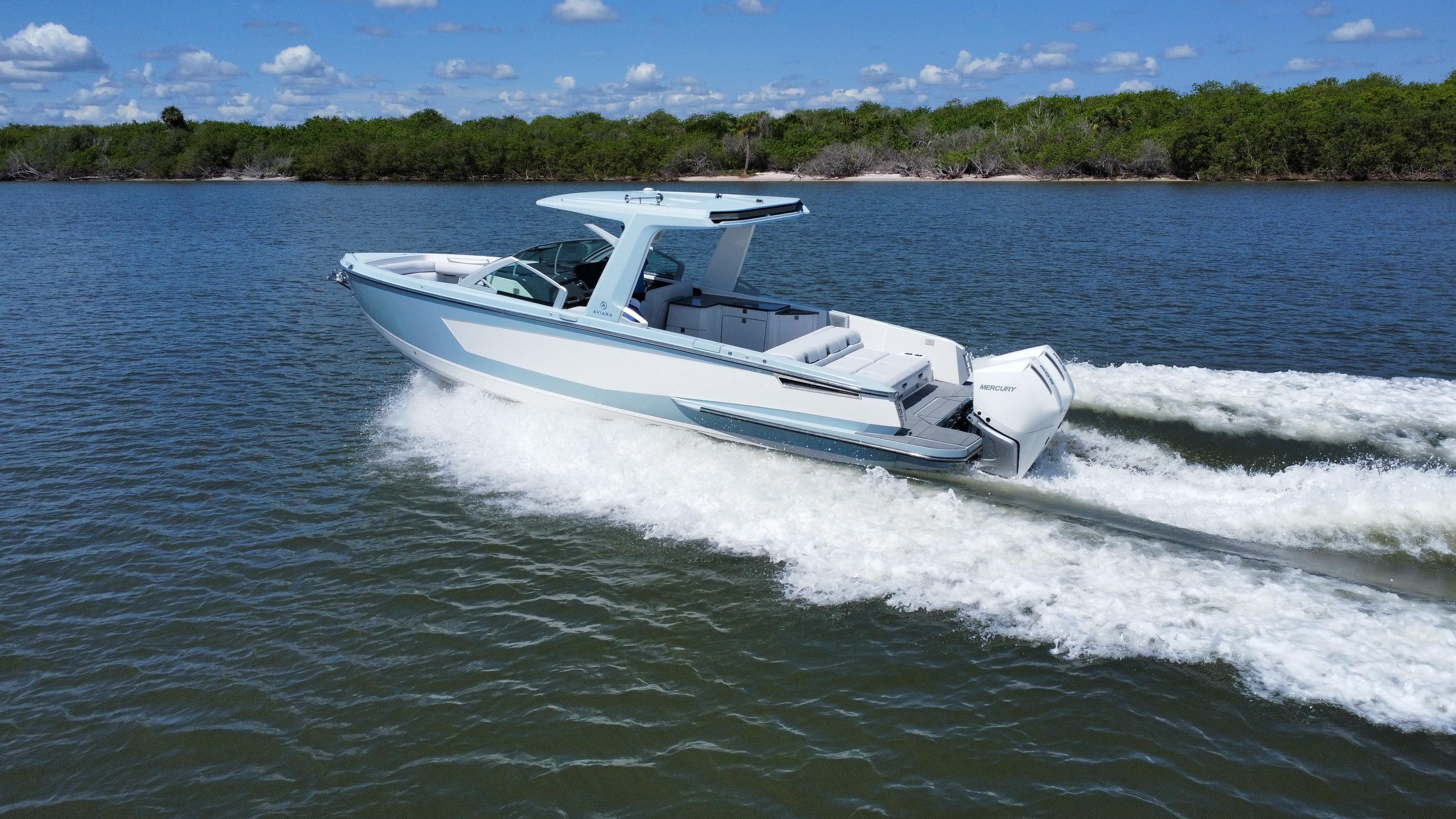 Aviara-AV32 OB 2021 -FL-US-2021 Aviara AV32 OB boat cruising on a lake.-9443715 | Thumbnail