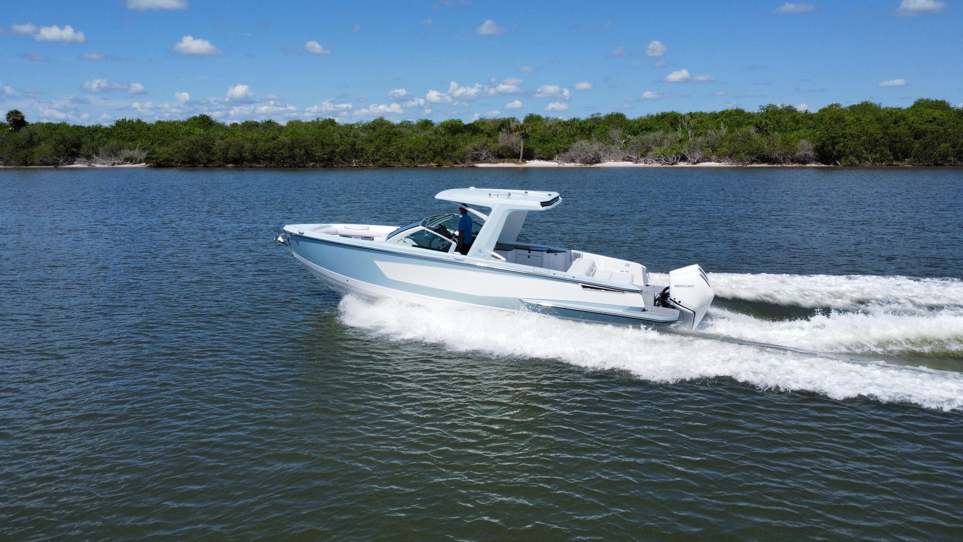 Aviara-AV32 OB 2021 -FL-US-2021 Aviara AV32 OB cruising on a calm lake.-9443715 | Thumbnail