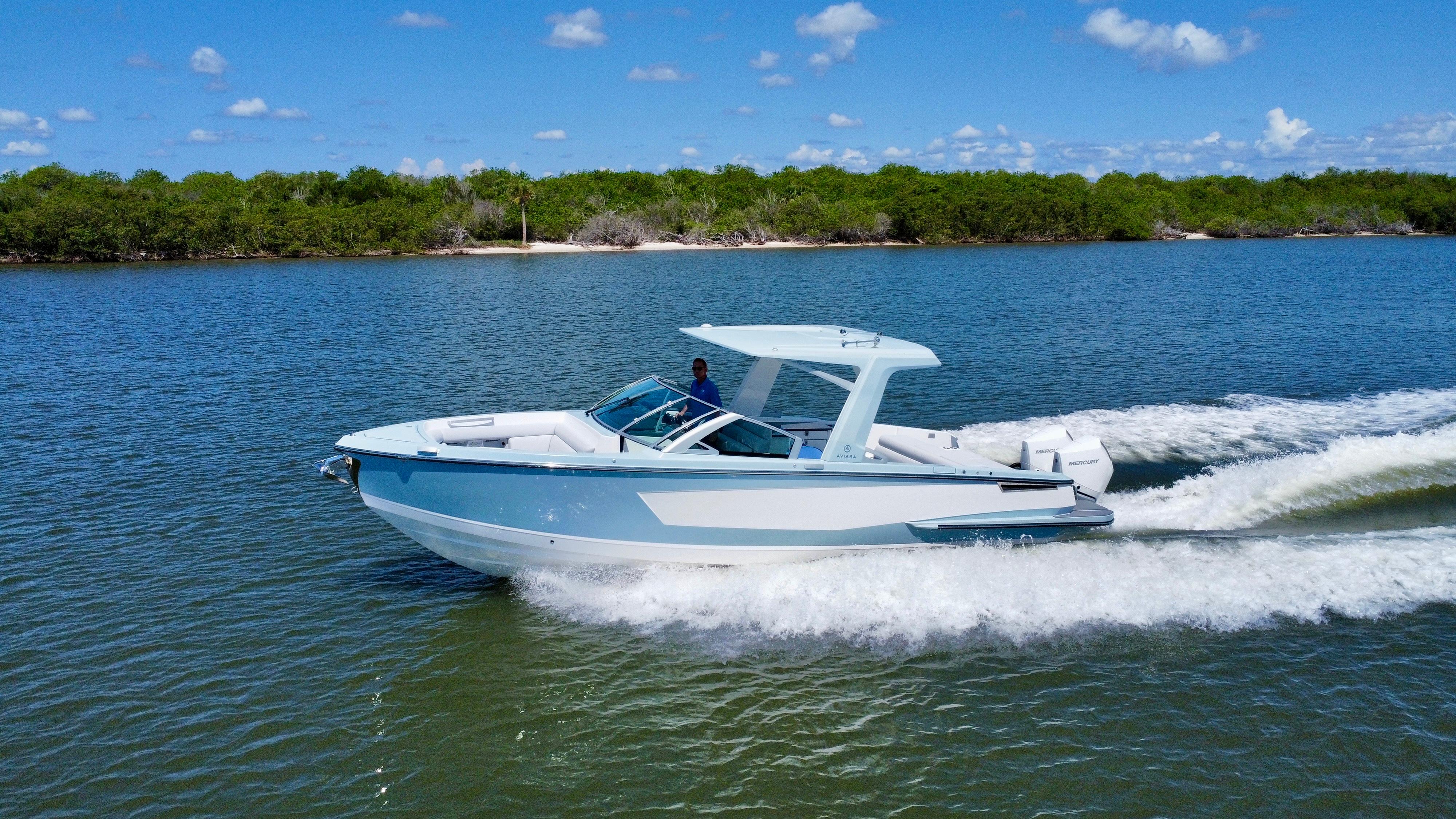 Aviara-AV32 OB 2021 -FL-US-2021 Aviara AV32 OB cruising on a sunny day in a scenic waterway.-9443715 | Thumbnail