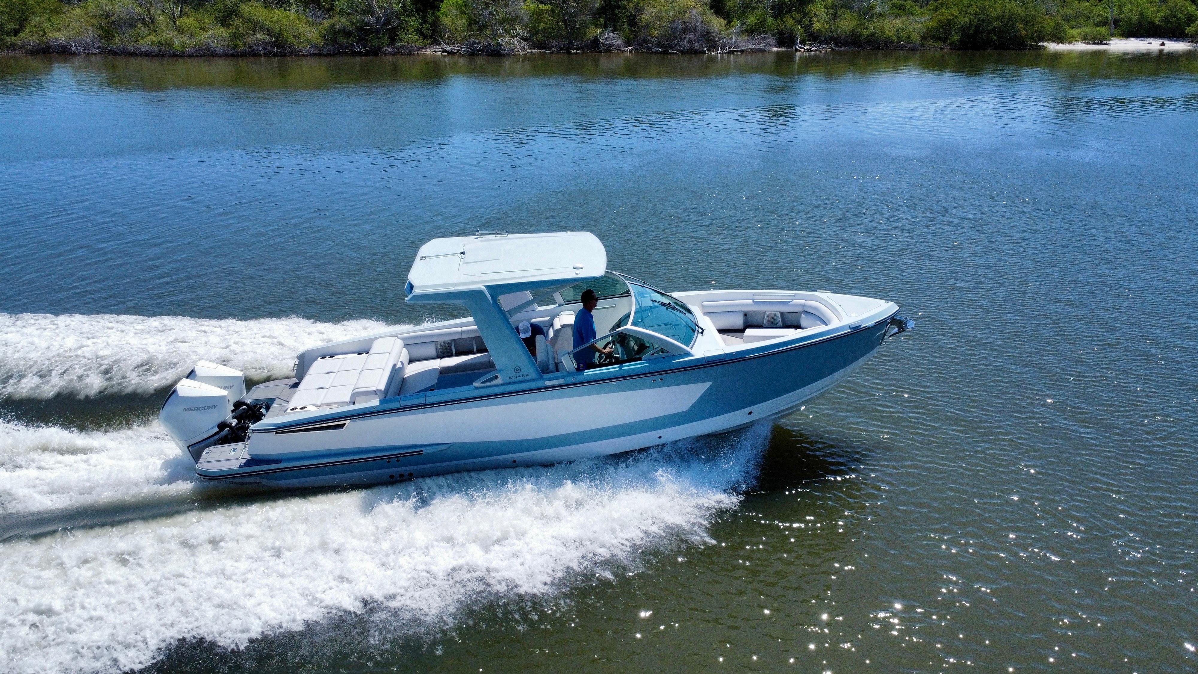 Aviara-AV32 OB 2021 -FL-US-2021 Aviara AV32 OB boat cruising on a calm lake.-9443715 | Thumbnail