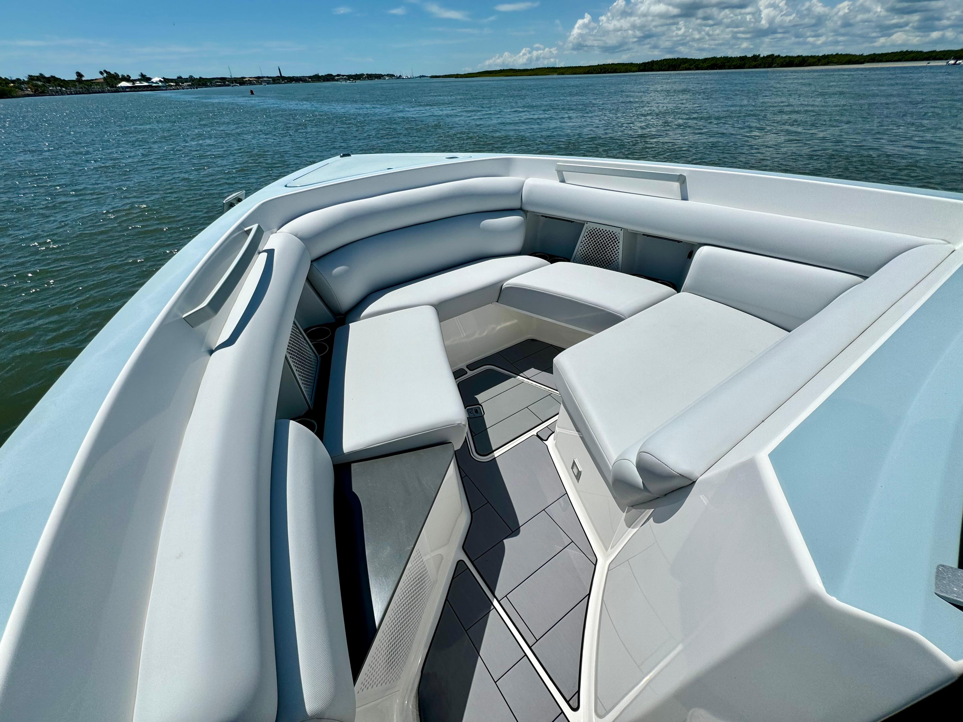 Aviara-AV32 OB 2021 -FL-US-2021 Aviara AV32 OB boat with spacious seating on a serene water backdrop.-9443715 | Thumbnail