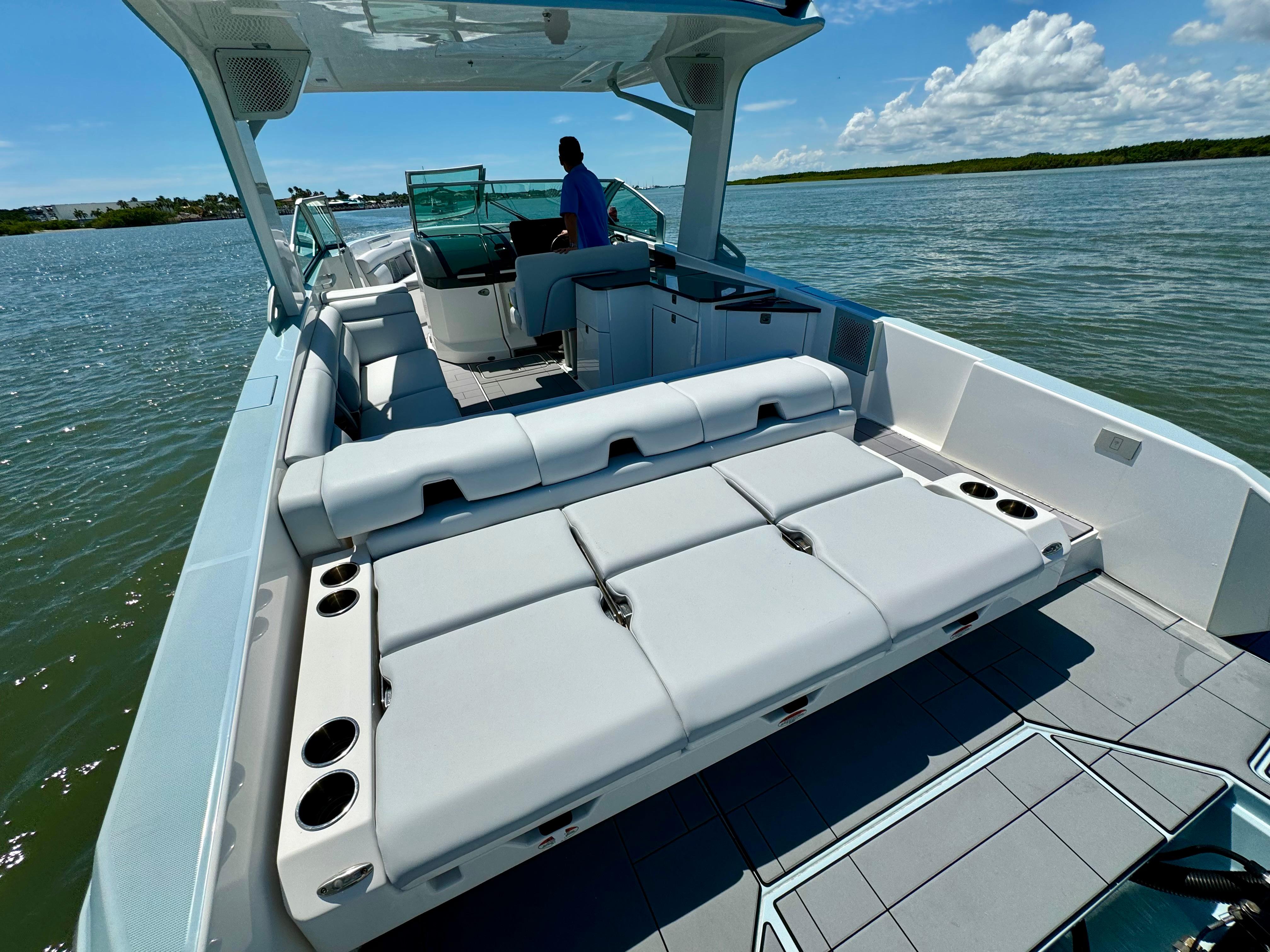 Aviara-AV32 OB 2021 -FL-US-2021 Aviara AV32 OB luxury boat with spacious seating and modern design on a sunny day.-9443715 | Thumbnail