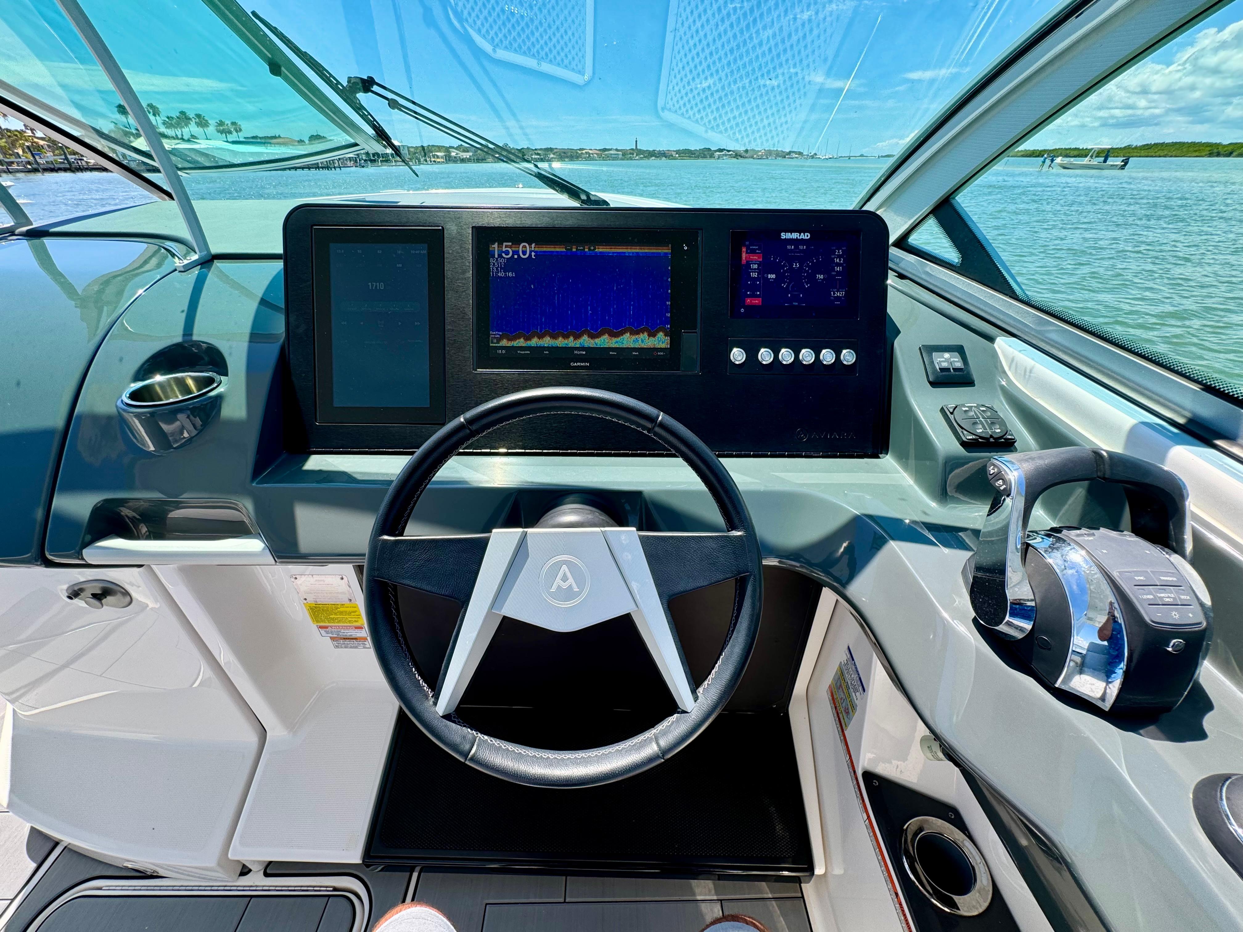 Aviara-AV32 OB 2021 -FL-US-2021 Aviara AV32 OB boat cockpit with modern steering wheel and digital displays.-9443715 | Thumbnail