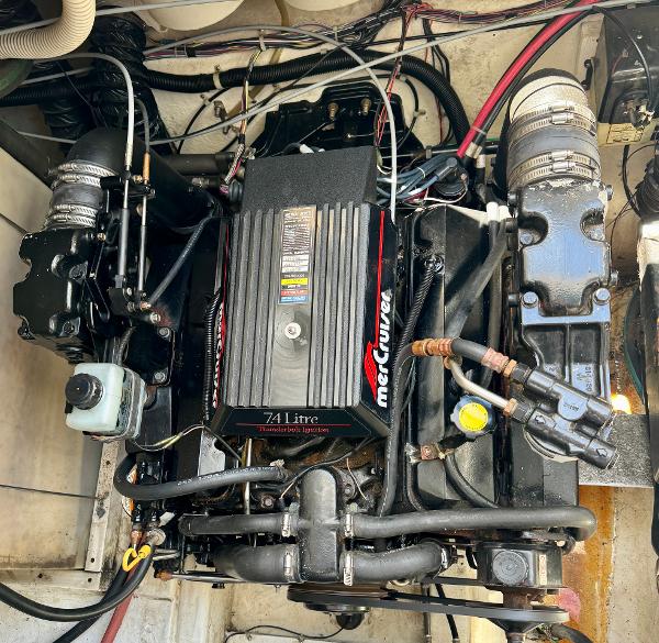 1997 Maxum 3200 SCR engine compartment with a 7.4-liter MerCruiser engine.