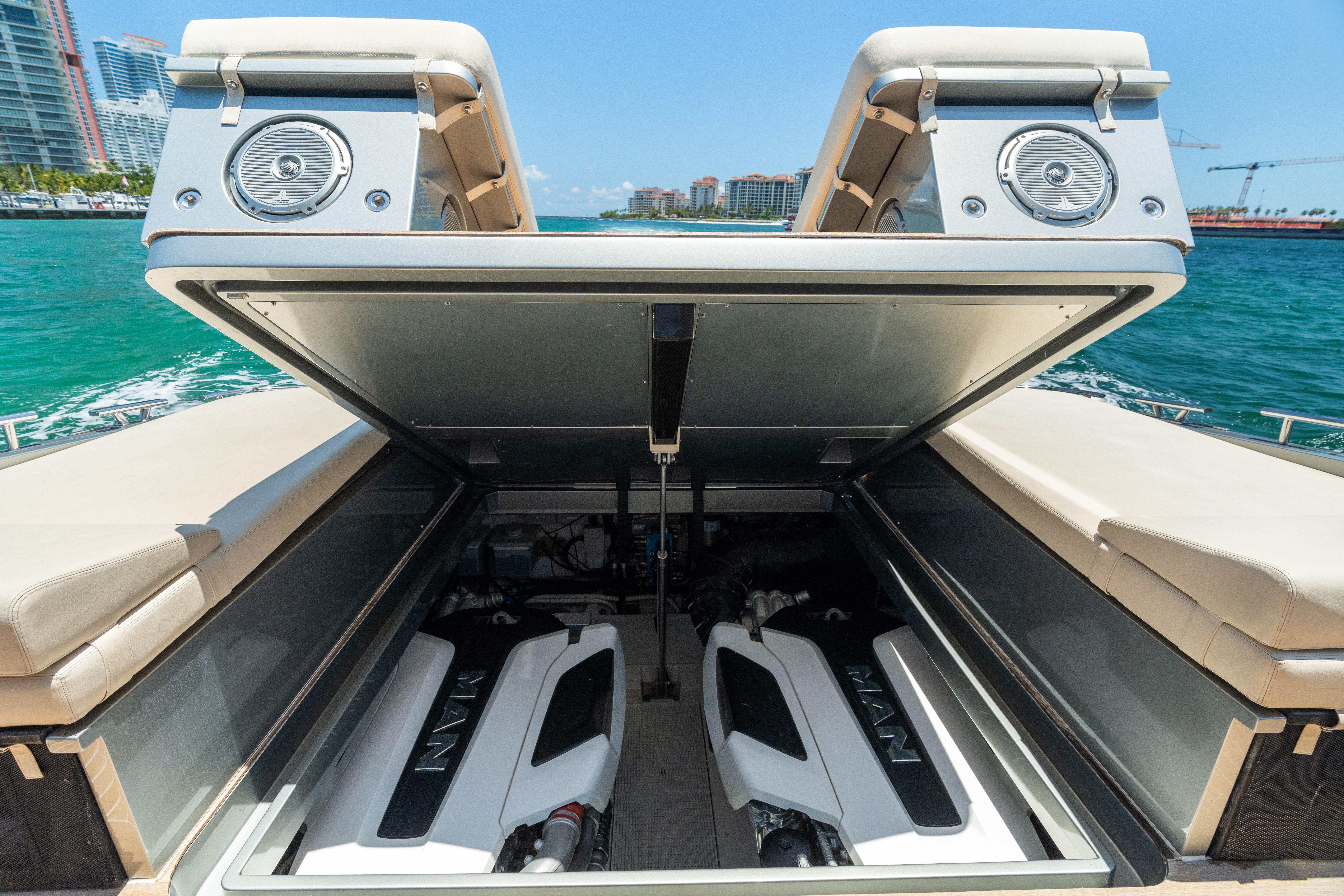 CNM-Continental 54 2019-YANINA FL-US-2019 CNM Continental 54T yacht engine compartment with dual MAN engines, open hatch, ocean backdrop.-9803754 | Thumbnail