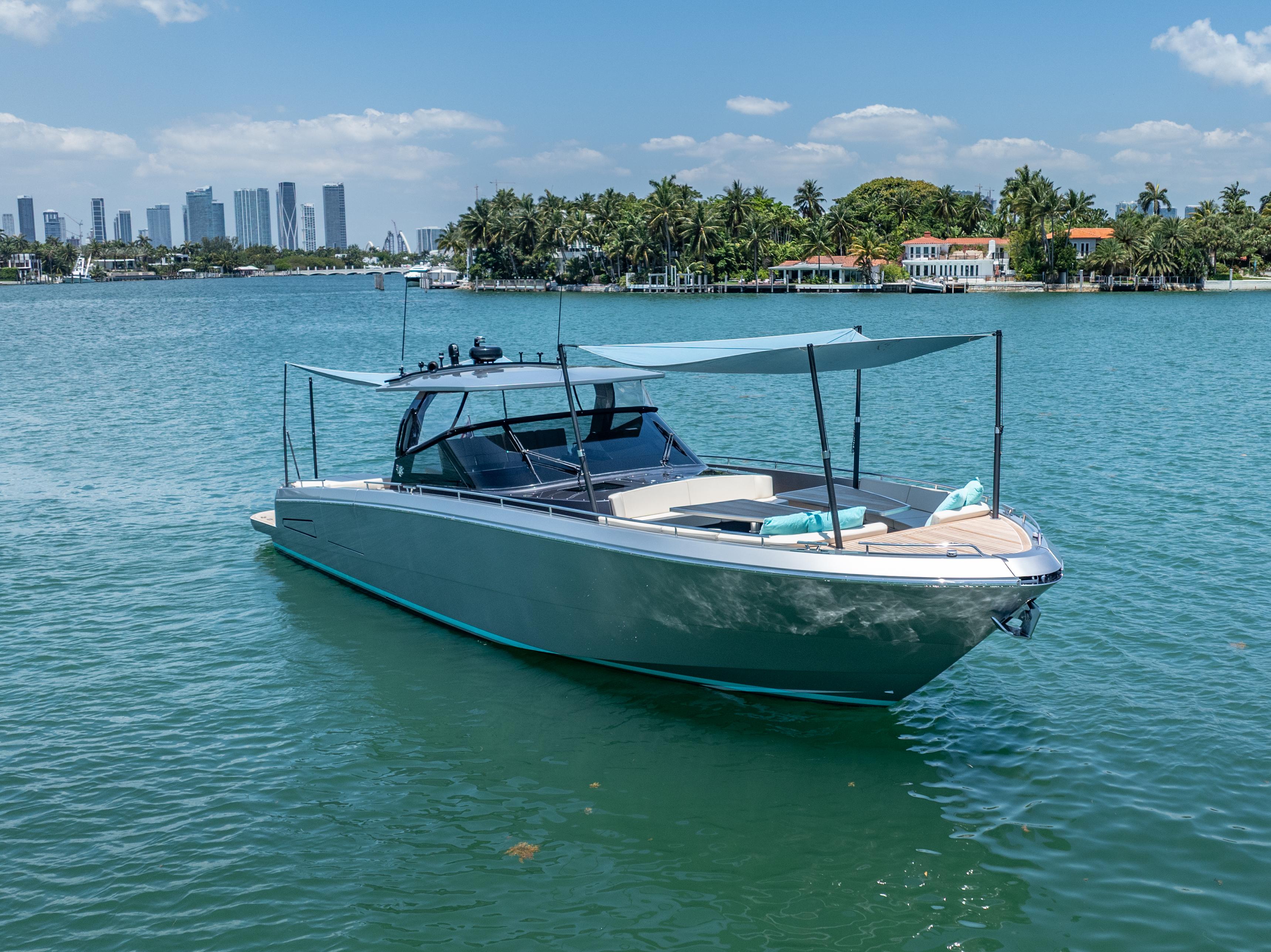 CNM-Continental 54 2019-YANINA FL-US-2019 CNM Continental 54T yacht on serene water with city skyline and palm trees.-9803754 | Thumbnail