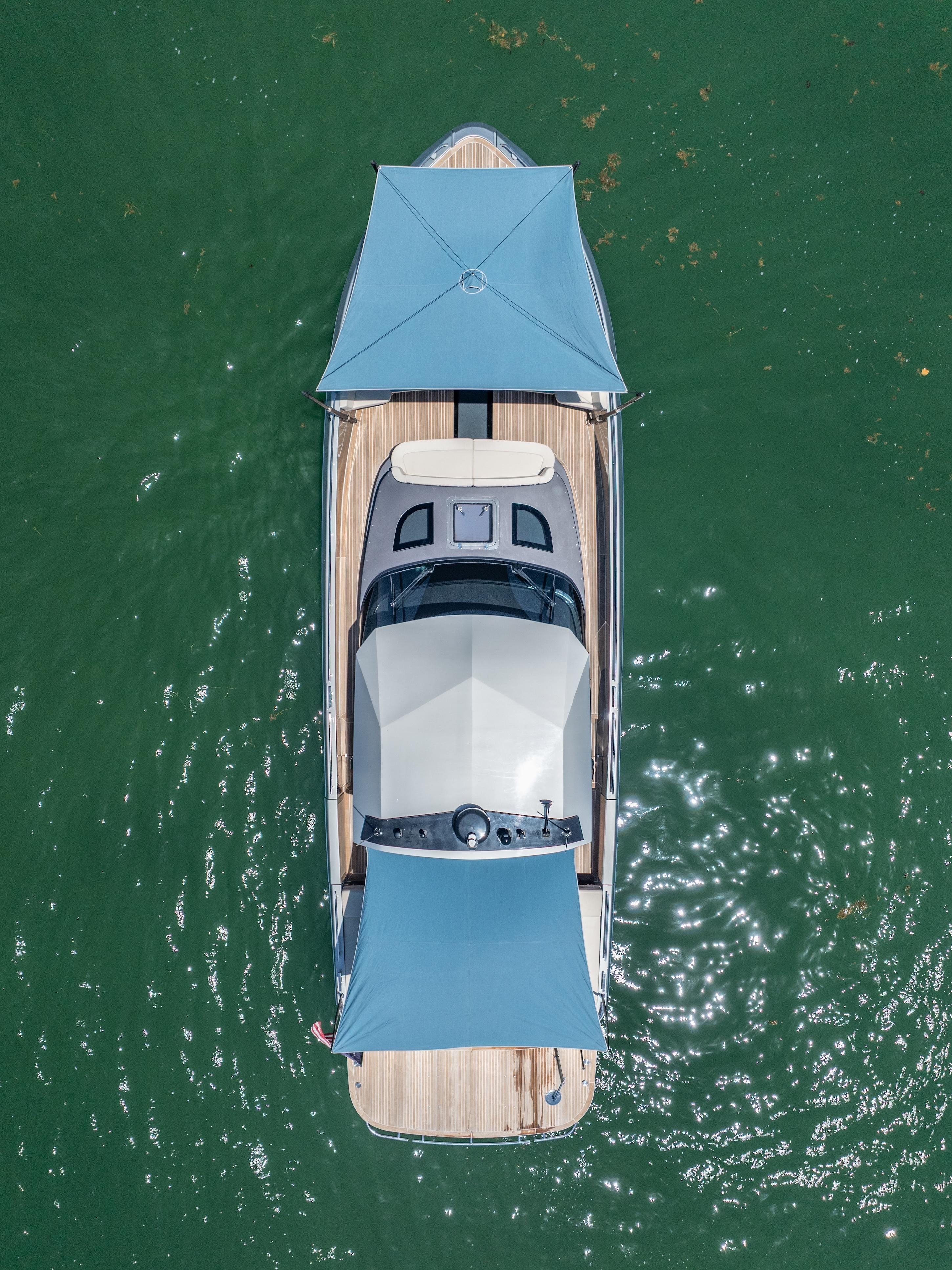 CNM-Continental 54 2019-YANINA FL-US-Aerial view of 2019 CNM Continental 54T yacht with blue canopies on green water.-9803754 | Thumbnail