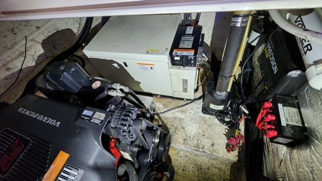 Engine compartment of 2005 Rinker Fiesta Vee 342 with Volvo Penta engine and electrical components.