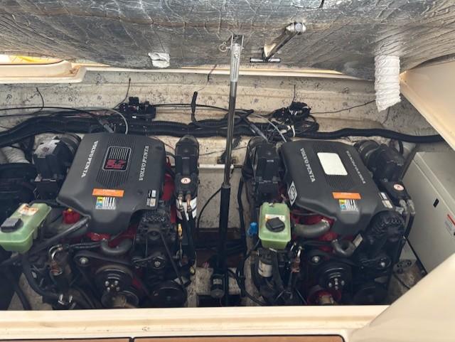 2005 Rinker Fiesta Vee 342 engine compartment with dual engines and mechanical components.