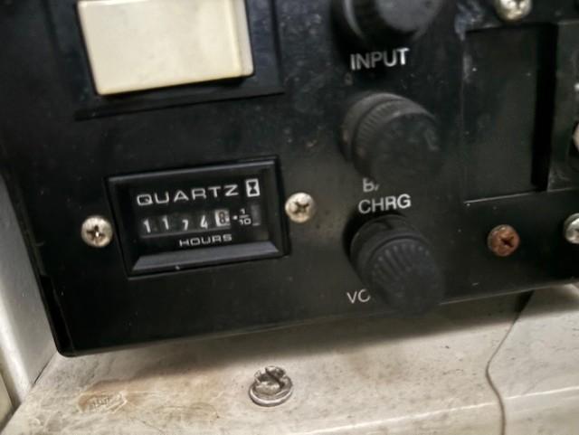 Control panel of a 2005 Rinker Fiesta Vee 342 boat showing 1174.8 hours on quartz meter.