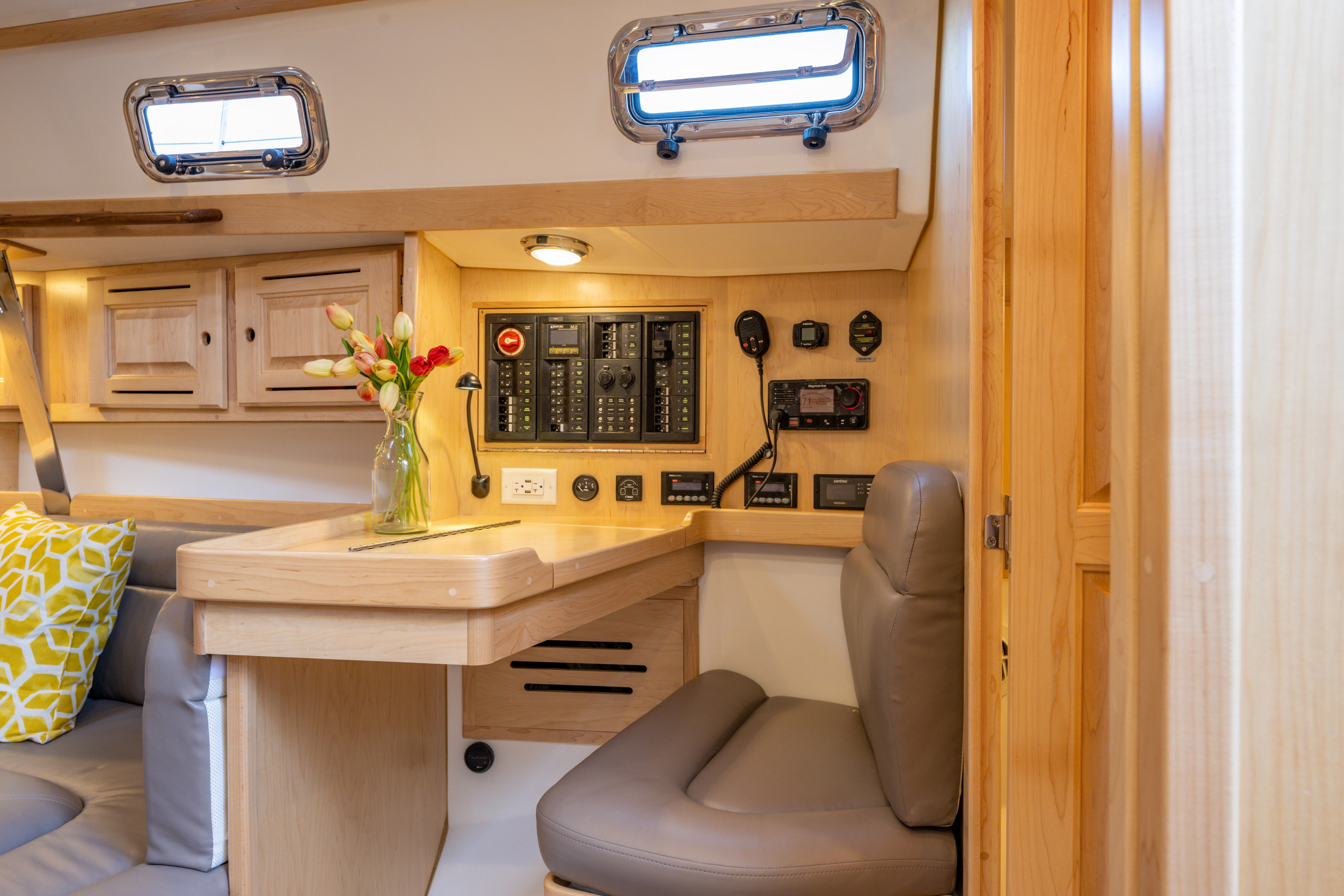 Tartan-365 2023-SEA #5 IN STOCK WA-US-Interior of 2023 Tartan 365 yacht with control panel and seating area.-9568831 | Thumbnail