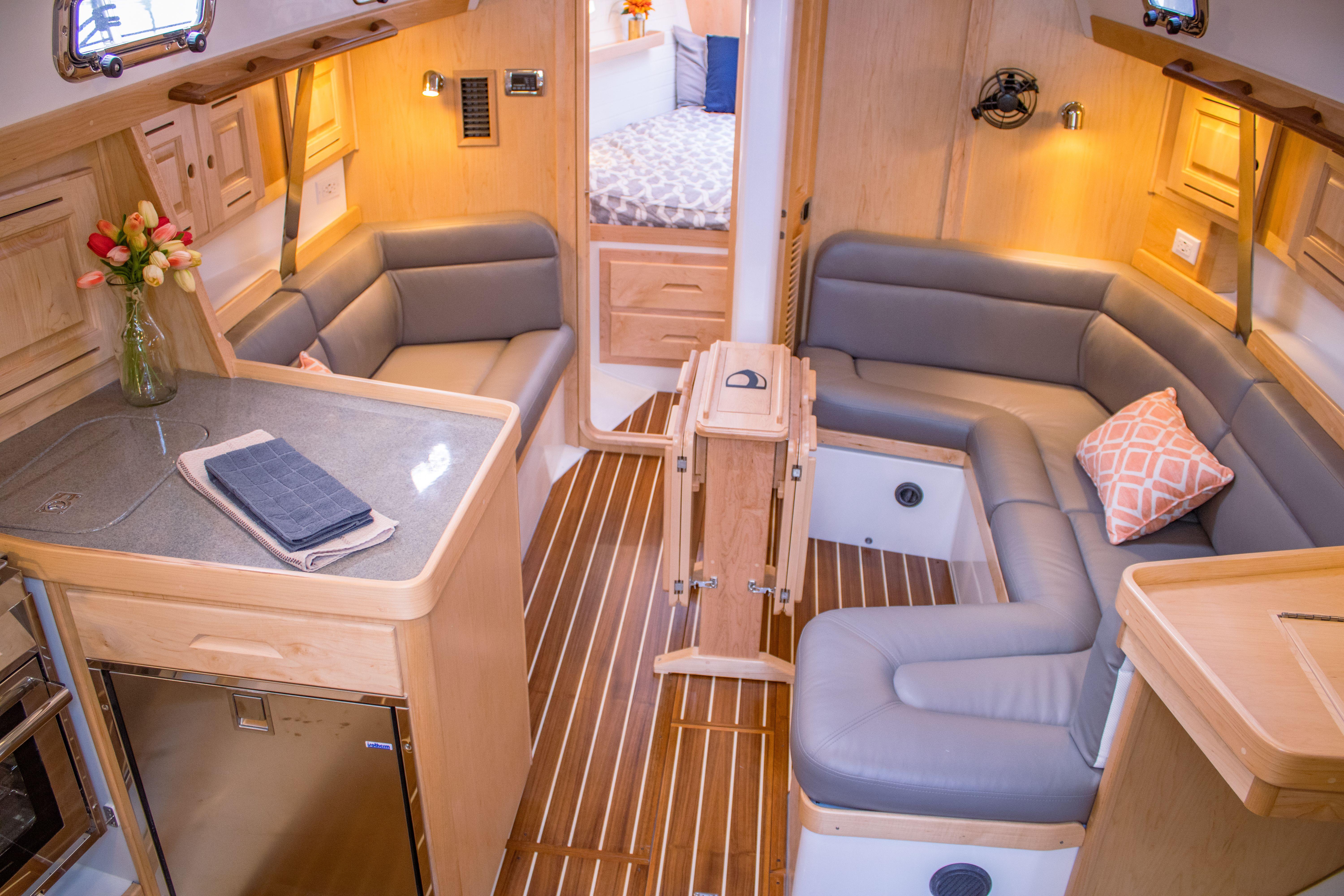 Tartan-365 2023-SEA #5 IN STOCK WA-US-Luxurious 2023 Tartan 365 yacht interior with cozy seating and elegant wood finishes.-9568831 | Thumbnail