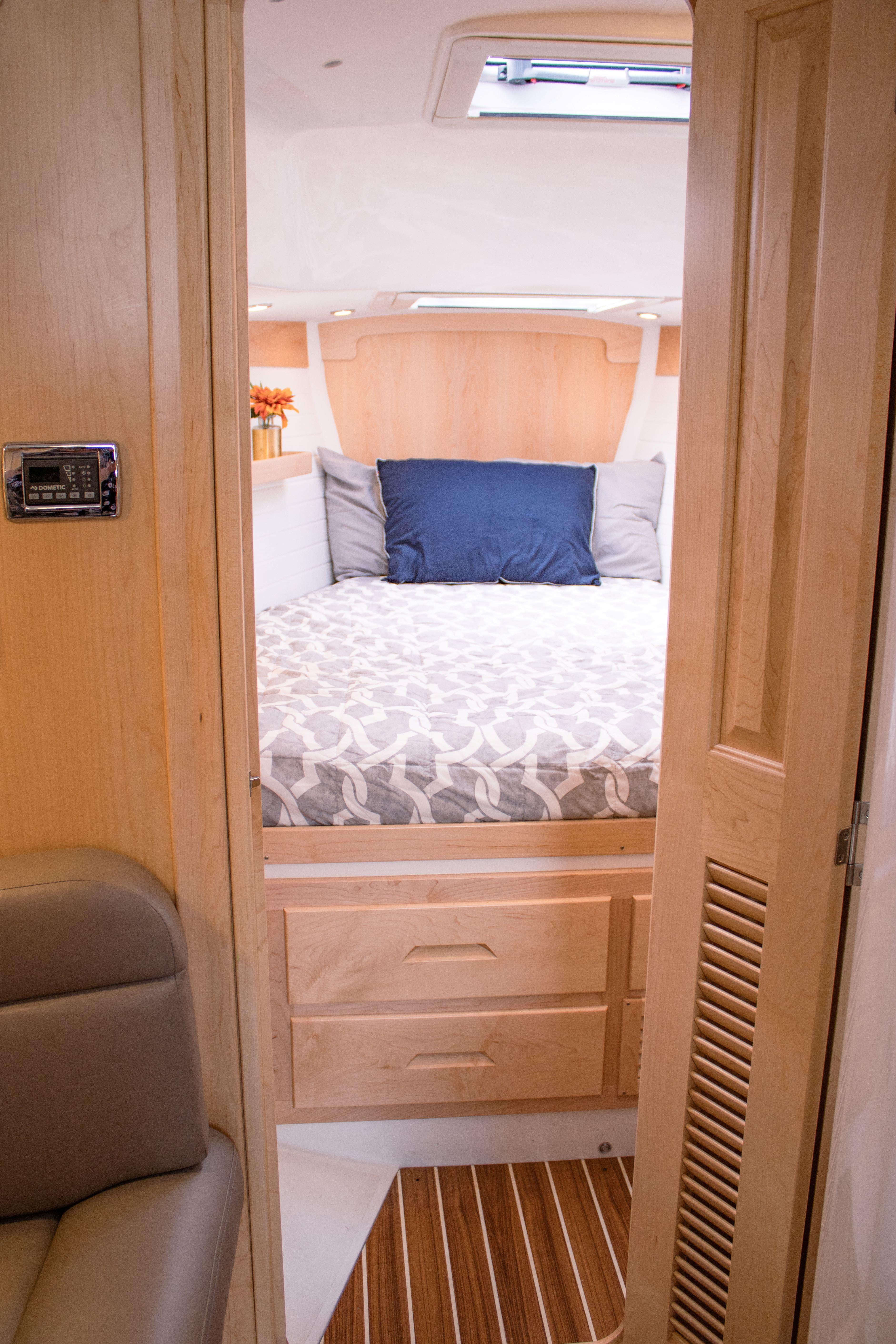Tartan-365 2023-SEA #5 IN STOCK WA-US-Cozy bedroom interior of 2023 Tartan 365 yacht with modern wood finish.-9568831 | Thumbnail