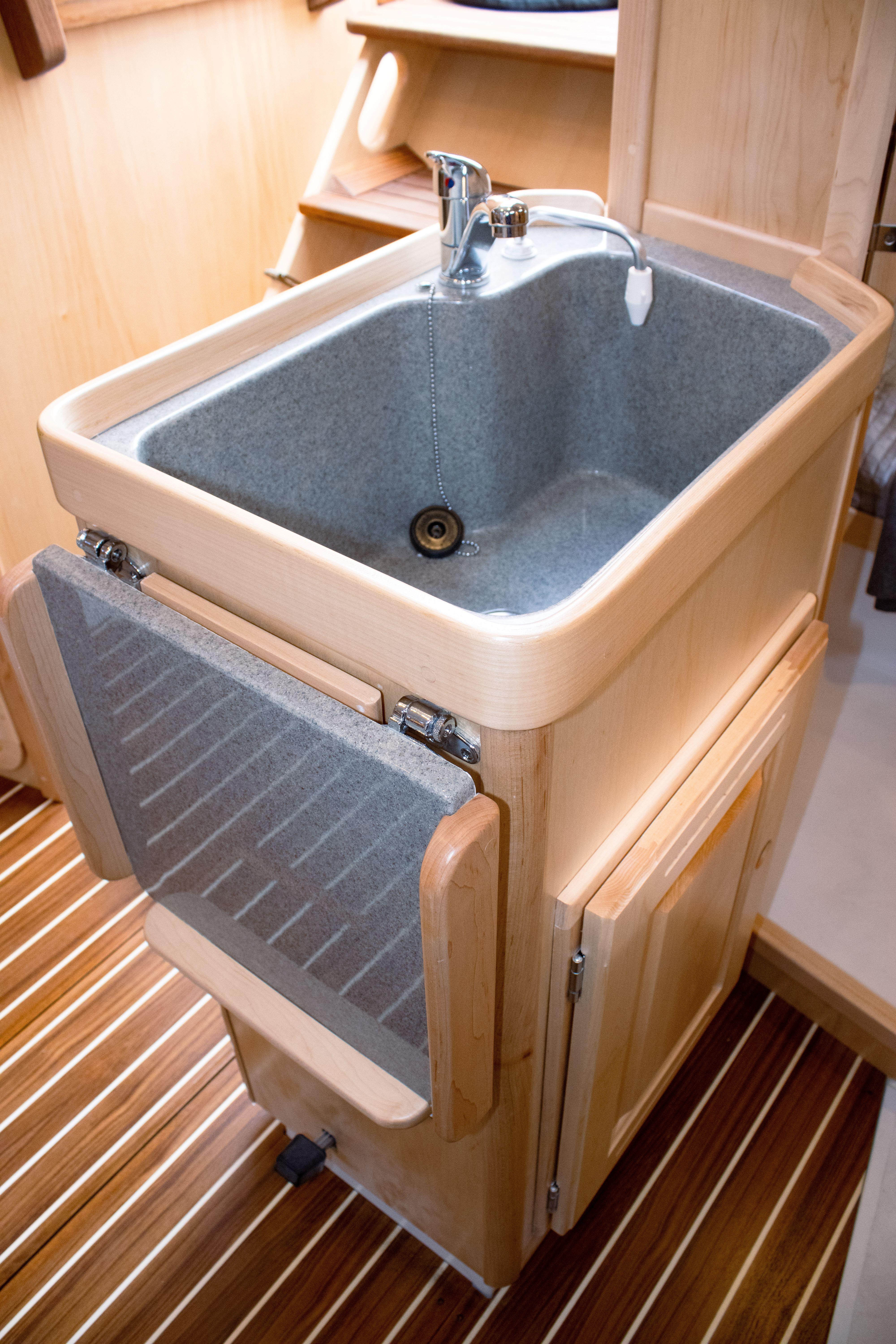 Tartan-365 2023-SEA #5 IN STOCK WA-US-Compact sink in 2023 Tartan 365 yacht interior with wooden cabinetry.-9568831 | Thumbnail