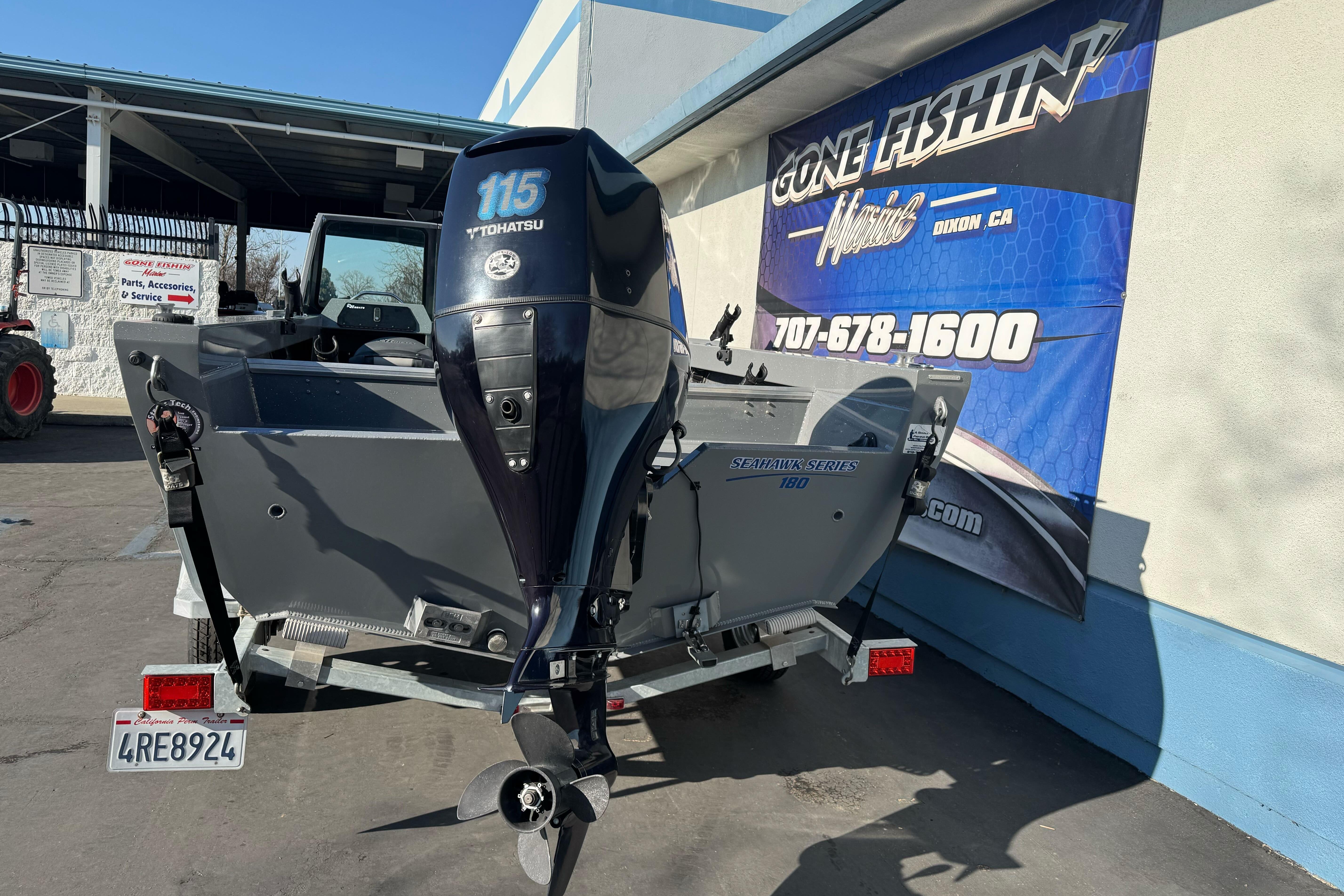 2017 RH Boats 18 SH with Tohatsu 115 engine at dealership.