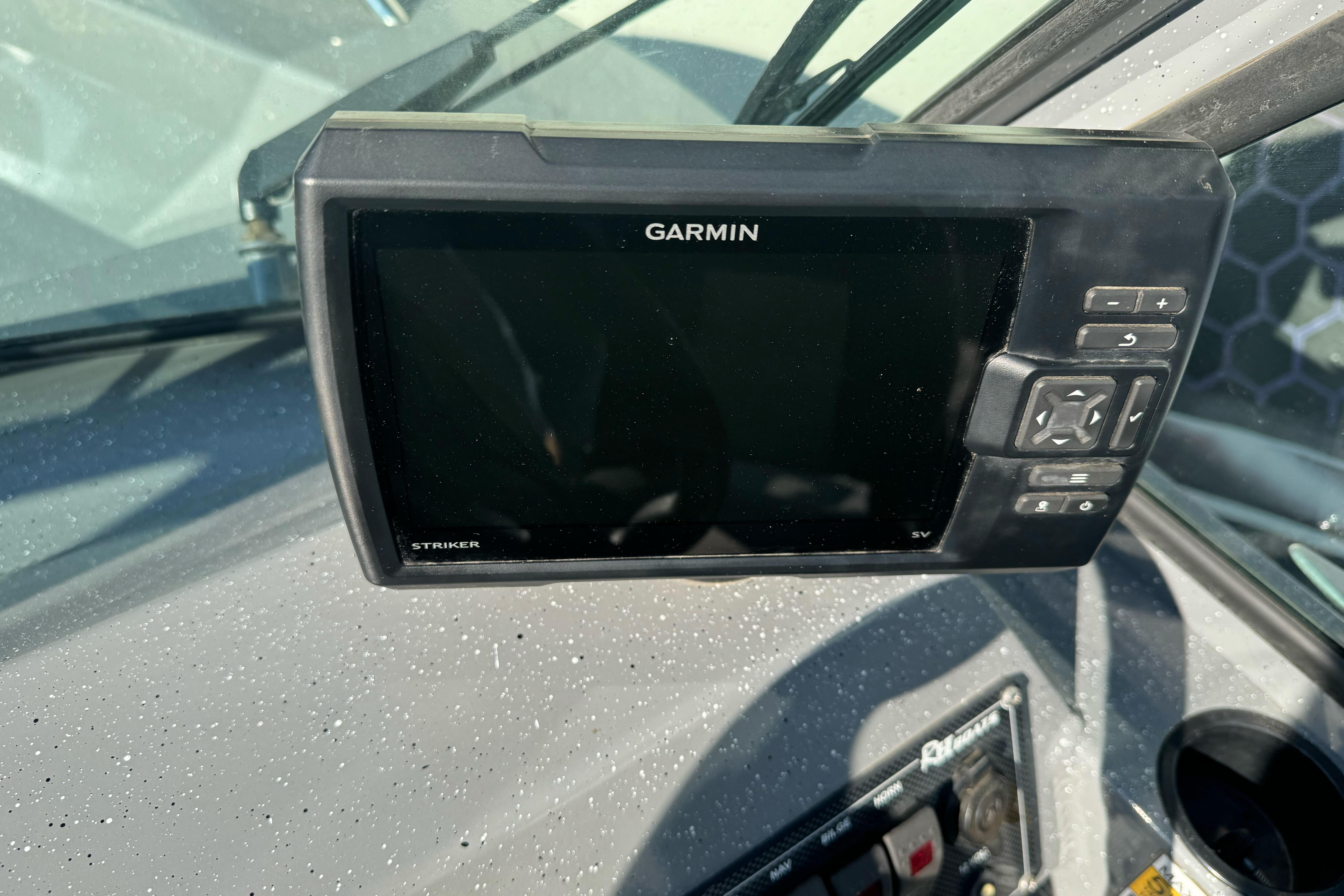 Garmin Striker fishfinder on 2017 RH Boats 18 SH dashboard.