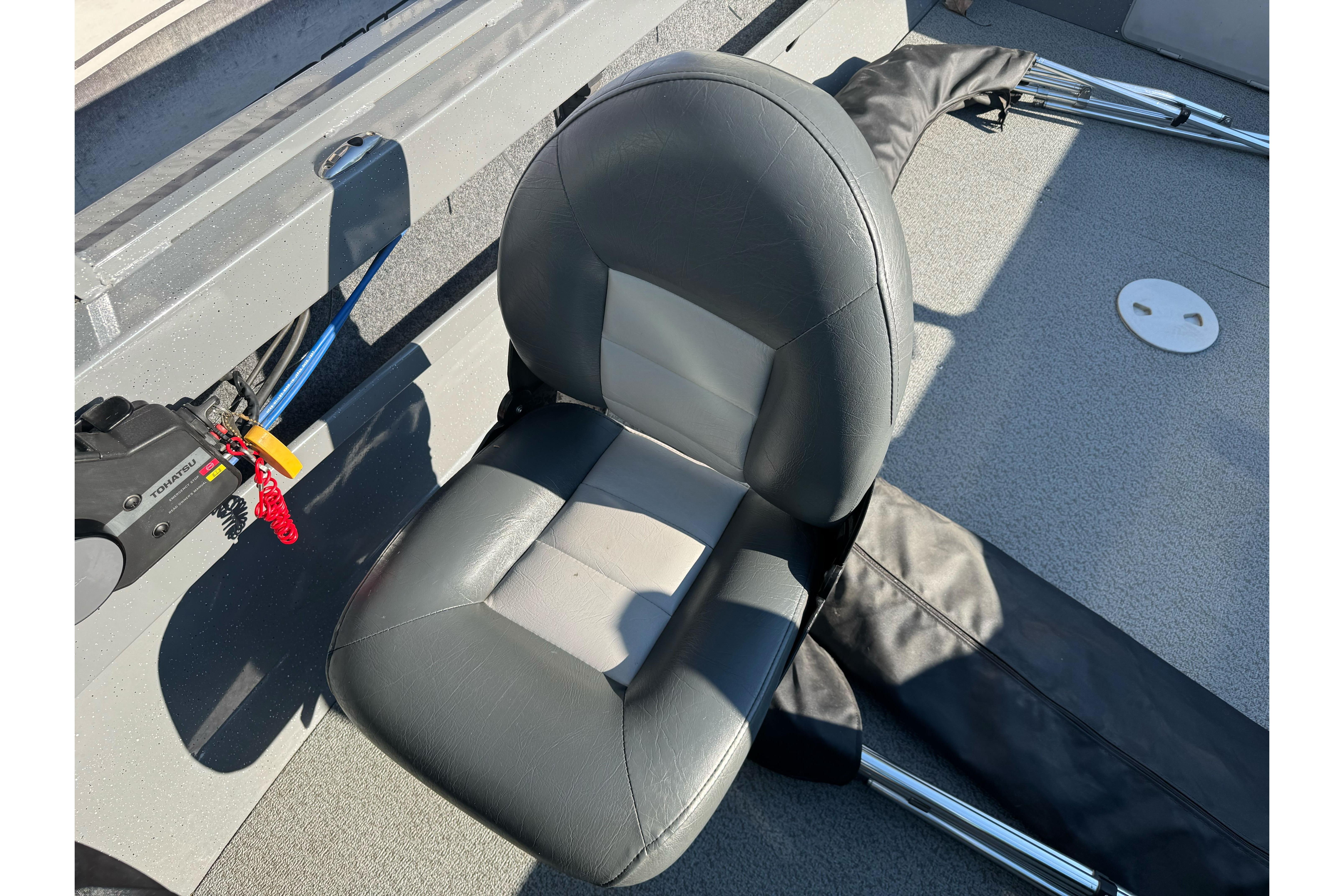 2017 RH Boats 18 SH interior with gray seating and boat controls.