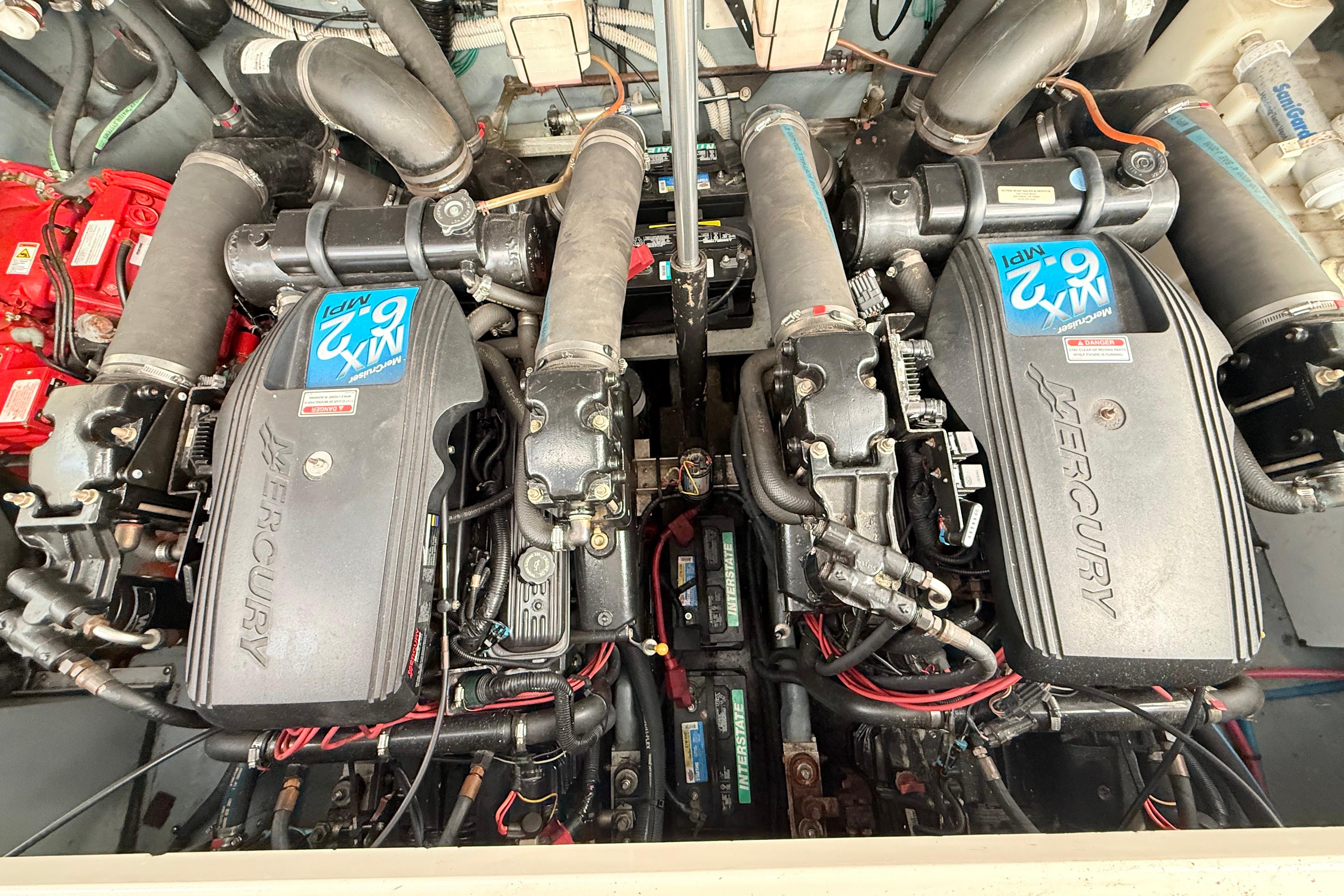 Engine room of a 2001 Sea Ray 340 Sundancer with twin Mercury engines.