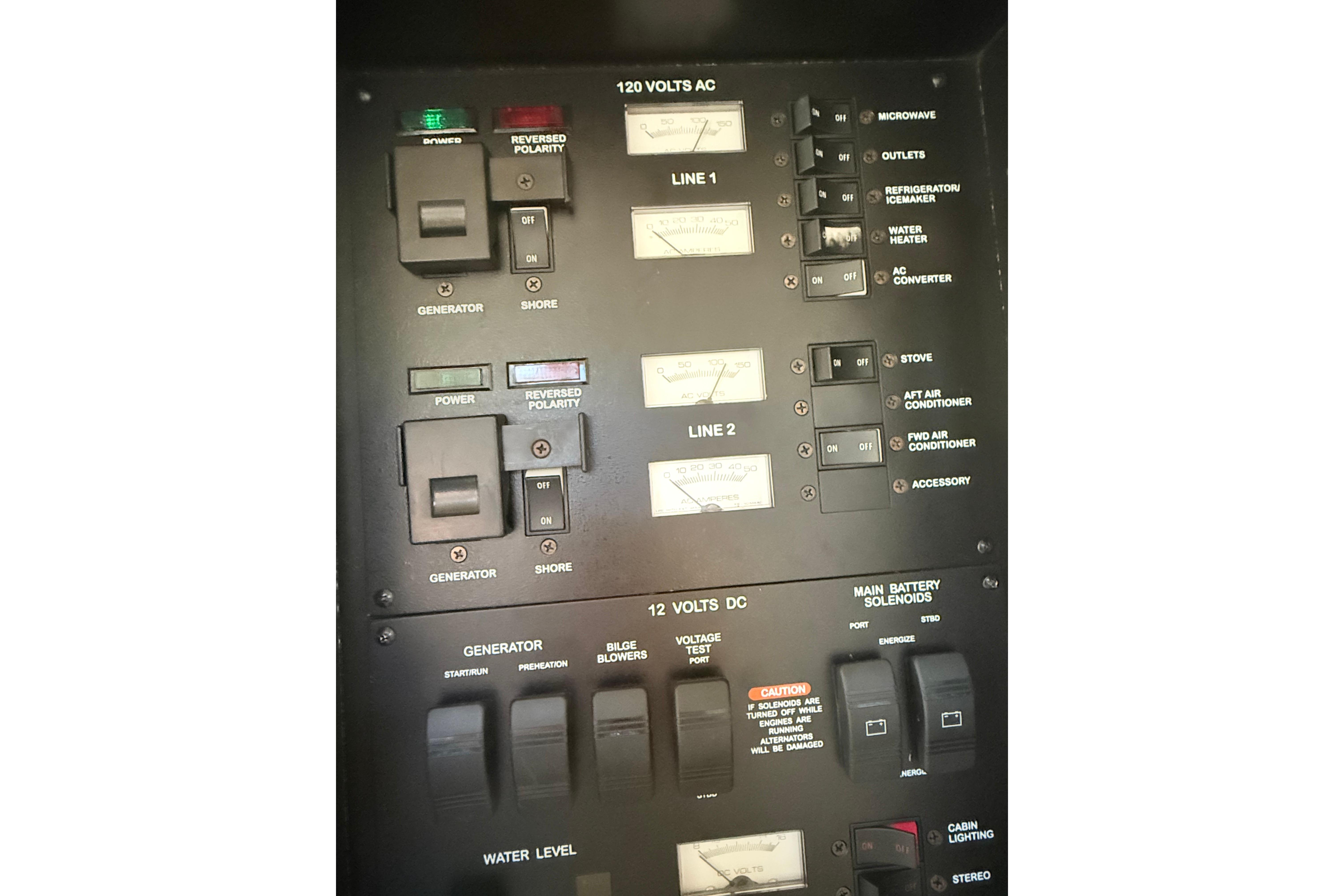 Electrical control panel on a 2001 Sea Ray 340 Sundancer boat.
