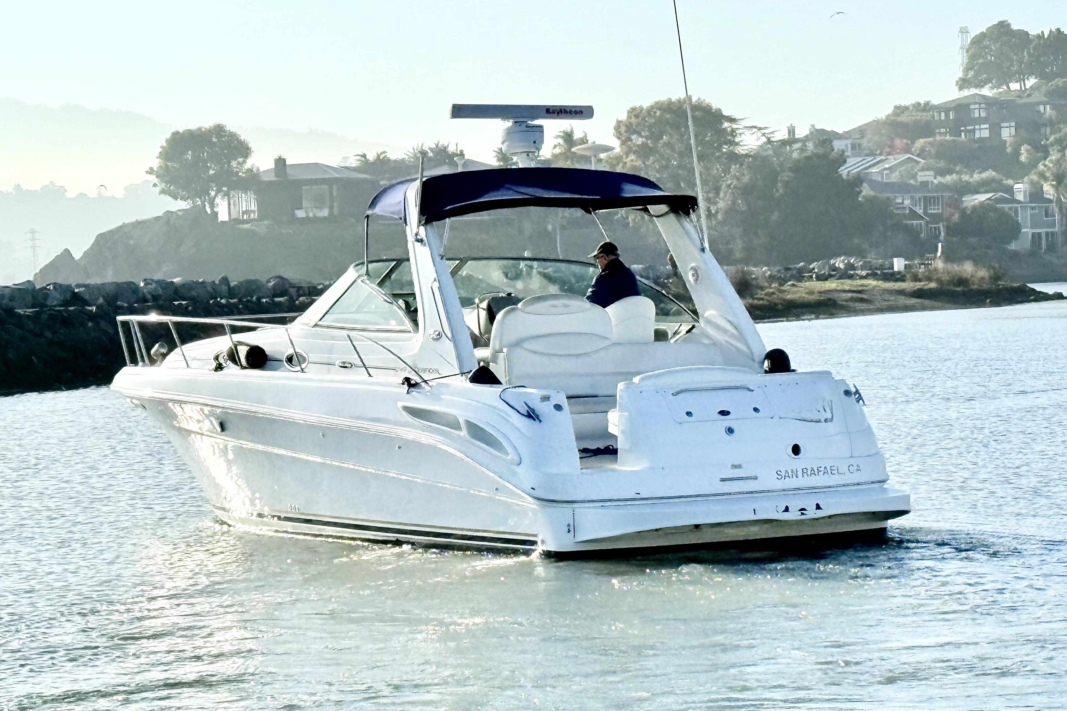 2001 Sea Ray 340 Sundancer boat cruising near San Rafael, CA.