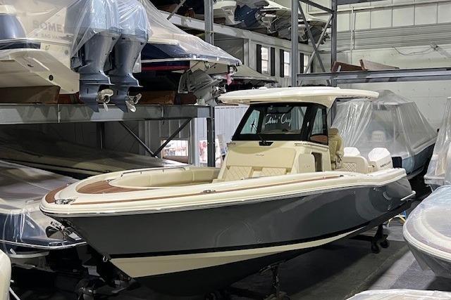 2023 Chris-Craft Catalina 30 boat in storage, showcasing sleek design and modern features.