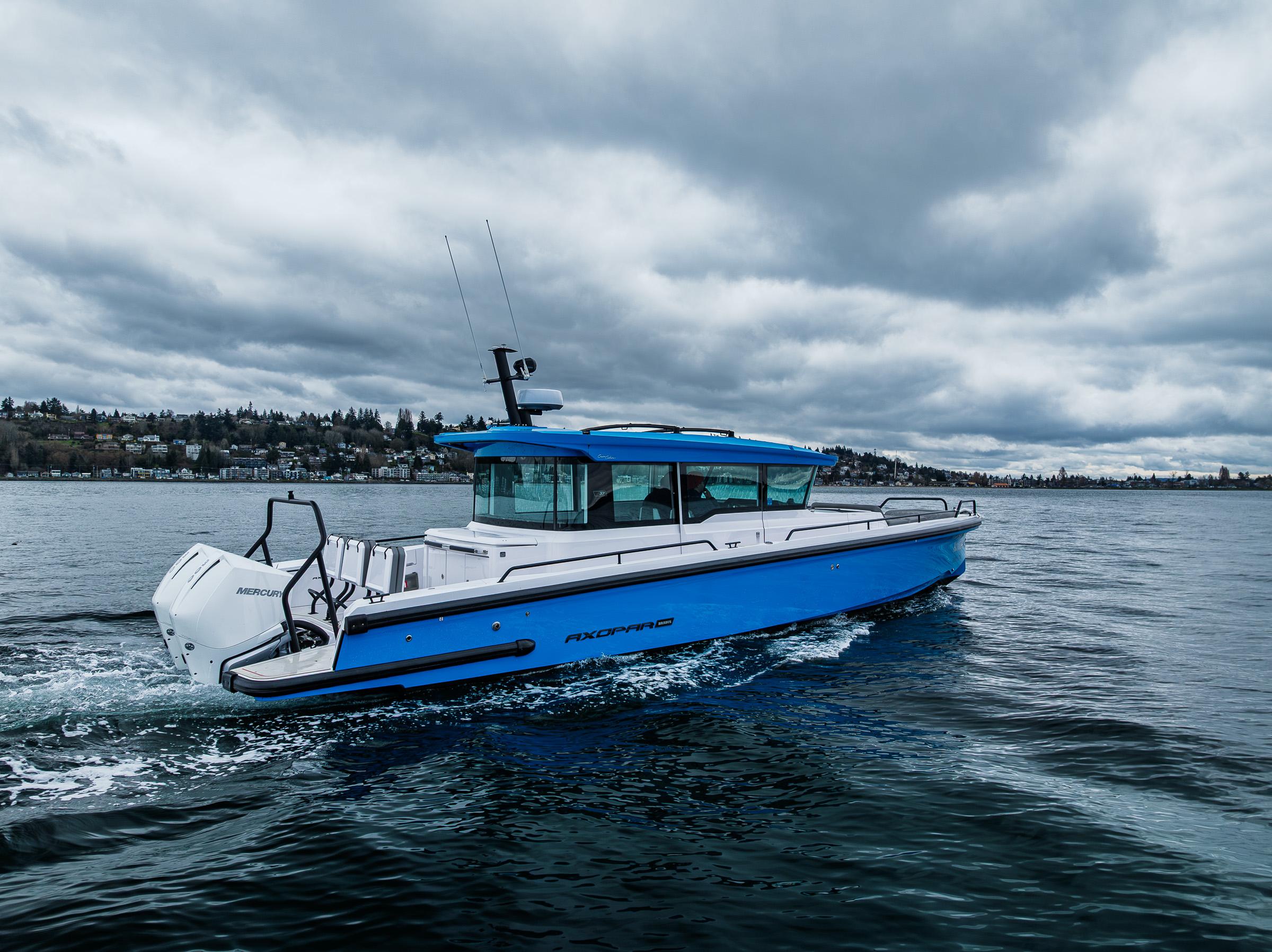 Axopar-37xc  Wetbar 2021-AQVAVIT WA-US-2021 Axopar 37xc Wetbar boat cruising on a cloudy day.-9703795 | Thumbnail
