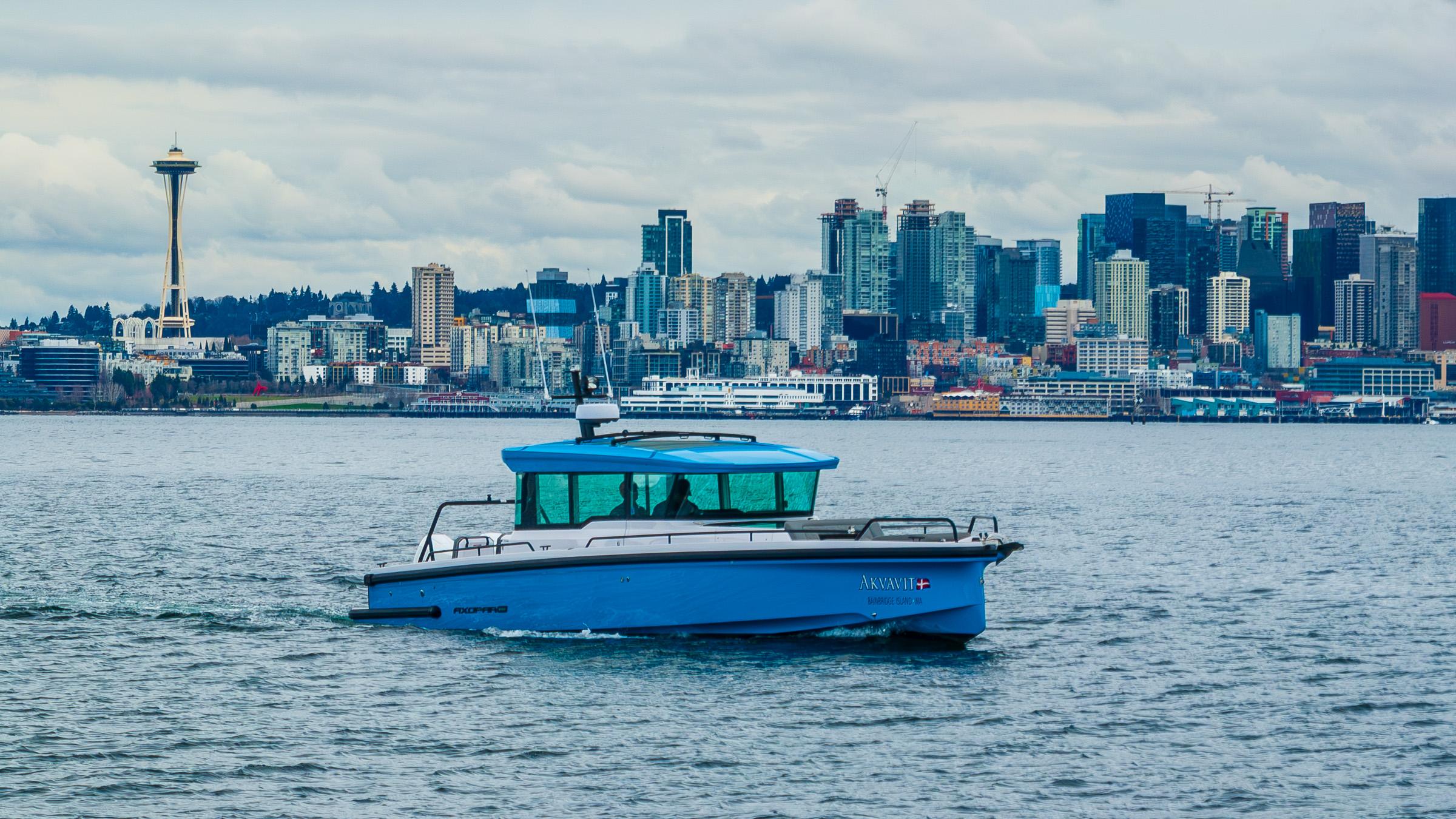 Axopar-37xc  Wetbar 2021-AQVAVIT WA-US-2021 Axopar 37xc Wetbar boat cruising with Seattle skyline in the background.-9703795 | Thumbnail