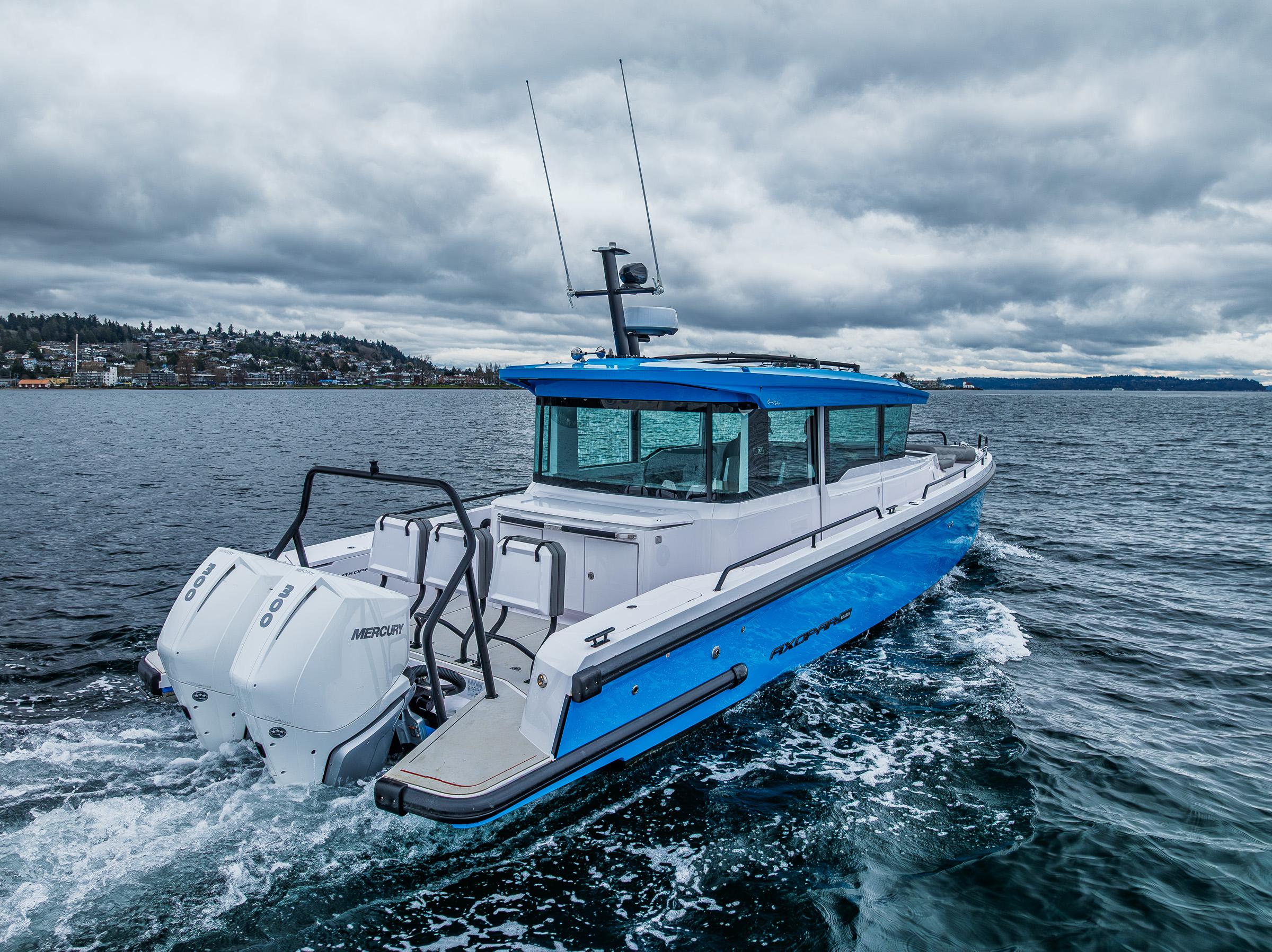 Axopar-37xc  Wetbar 2021-AQVAVIT WA-US-2021 Axopar 37xc Wetbar boat cruising on a cloudy day.-9703795 | Thumbnail