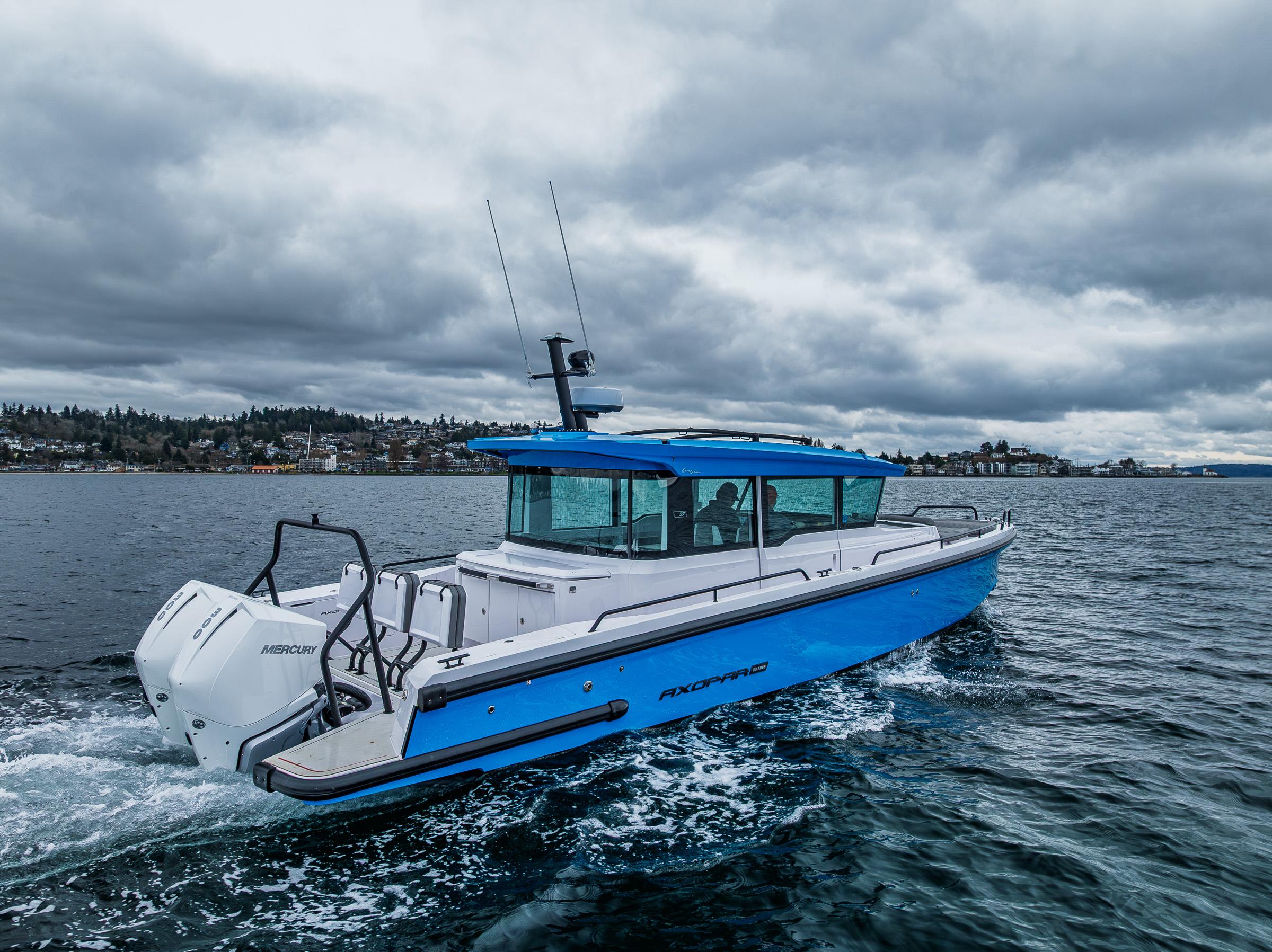 Axopar-37xc  Wetbar 2021-AQVAVIT WA-US-2021 Axopar 37xc Wetbar boat cruising on a cloudy day.-9703795 | Thumbnail