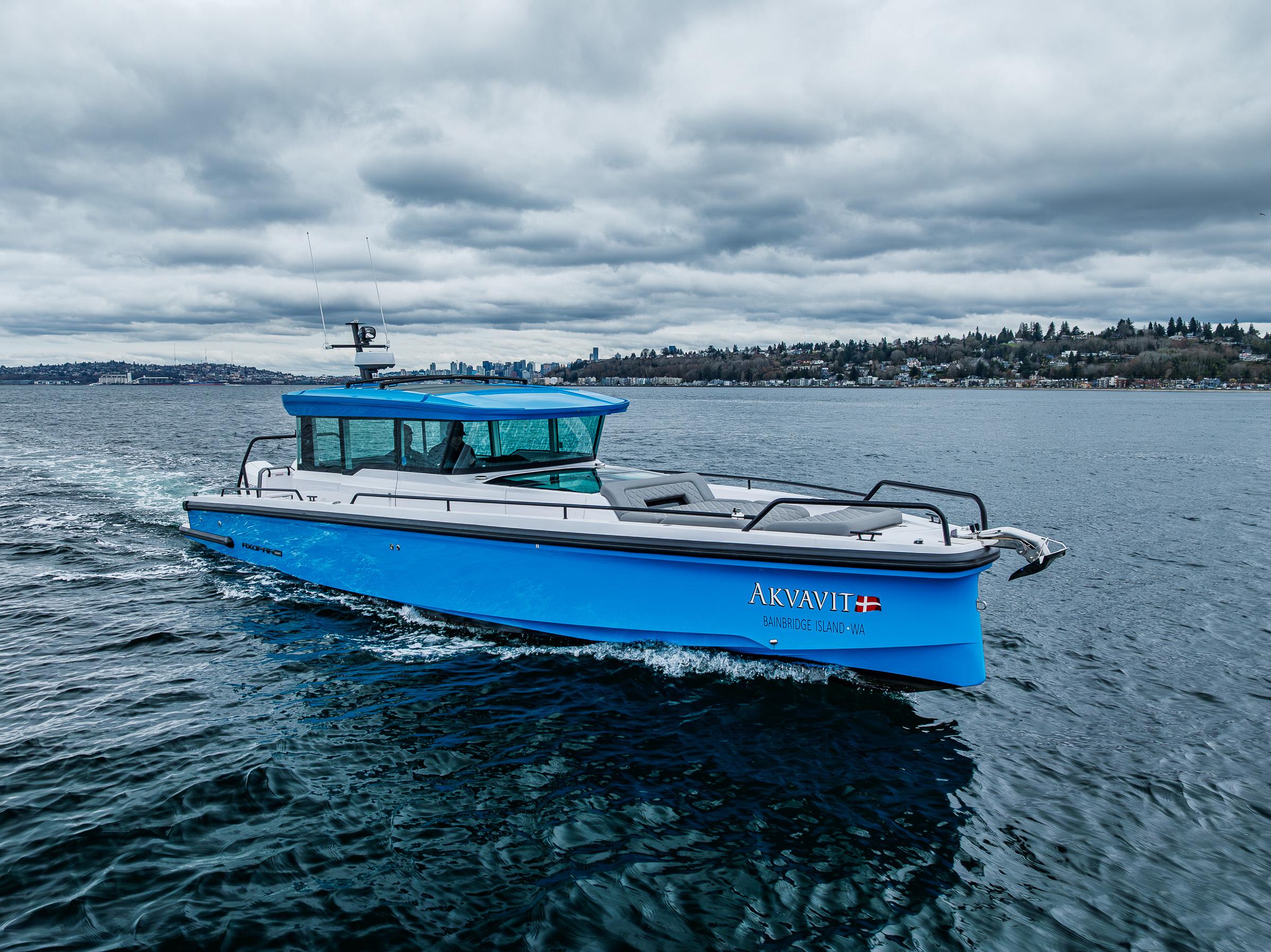 Axopar-37xc  Wetbar 2021-AQVAVIT WA-US-2021 Axopar 37xc Wetbar boat cruising on a cloudy day.-9703795 | Thumbnail