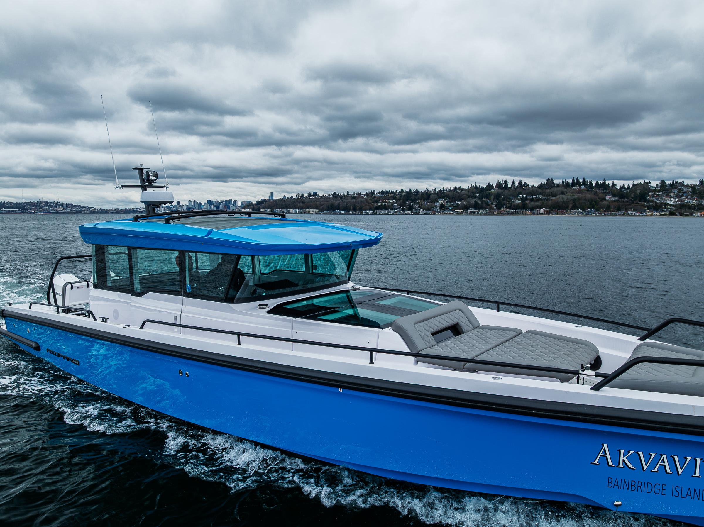 Axopar-37xc  Wetbar 2021-AQVAVIT WA-US-2021 Axopar 37xc Wetbar boat cruising on a cloudy day.-9703795 | Thumbnail