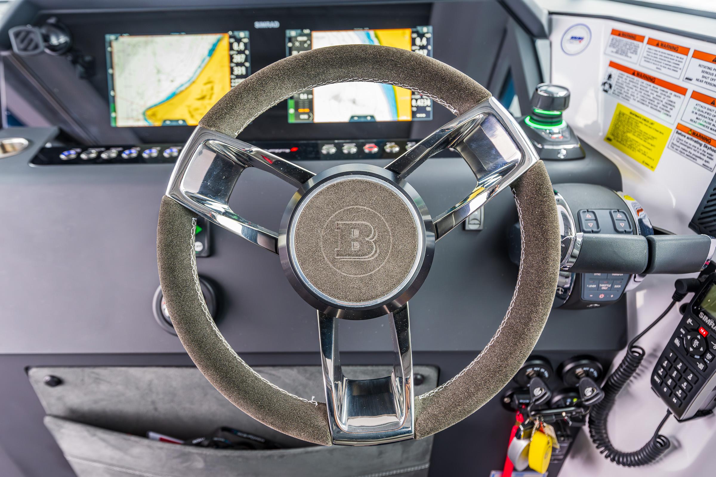 Axopar-37xc  Wetbar 2021-AQVAVIT WA-US-Steering wheel and dashboard of 2021 Axopar 37xc Wetbar boat, featuring navigation screens.-9703795 | Thumbnail