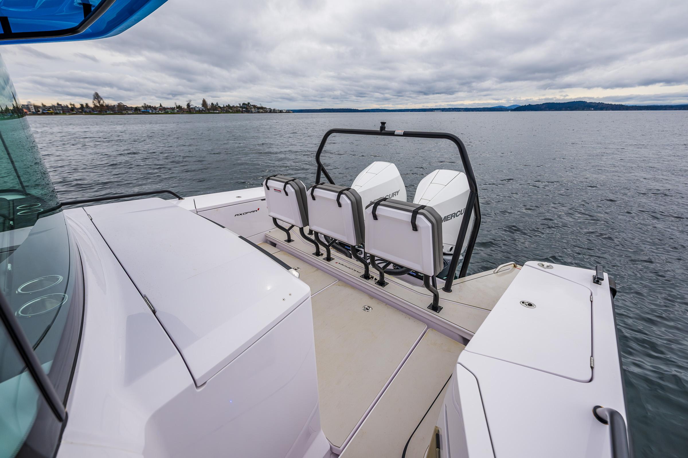Axopar-37xc  Wetbar 2021-AQVAVIT WA-US-2021 Axopar 37xc Wetbar boat on calm water, featuring sleek design and spacious deck.-9703795 | Thumbnail