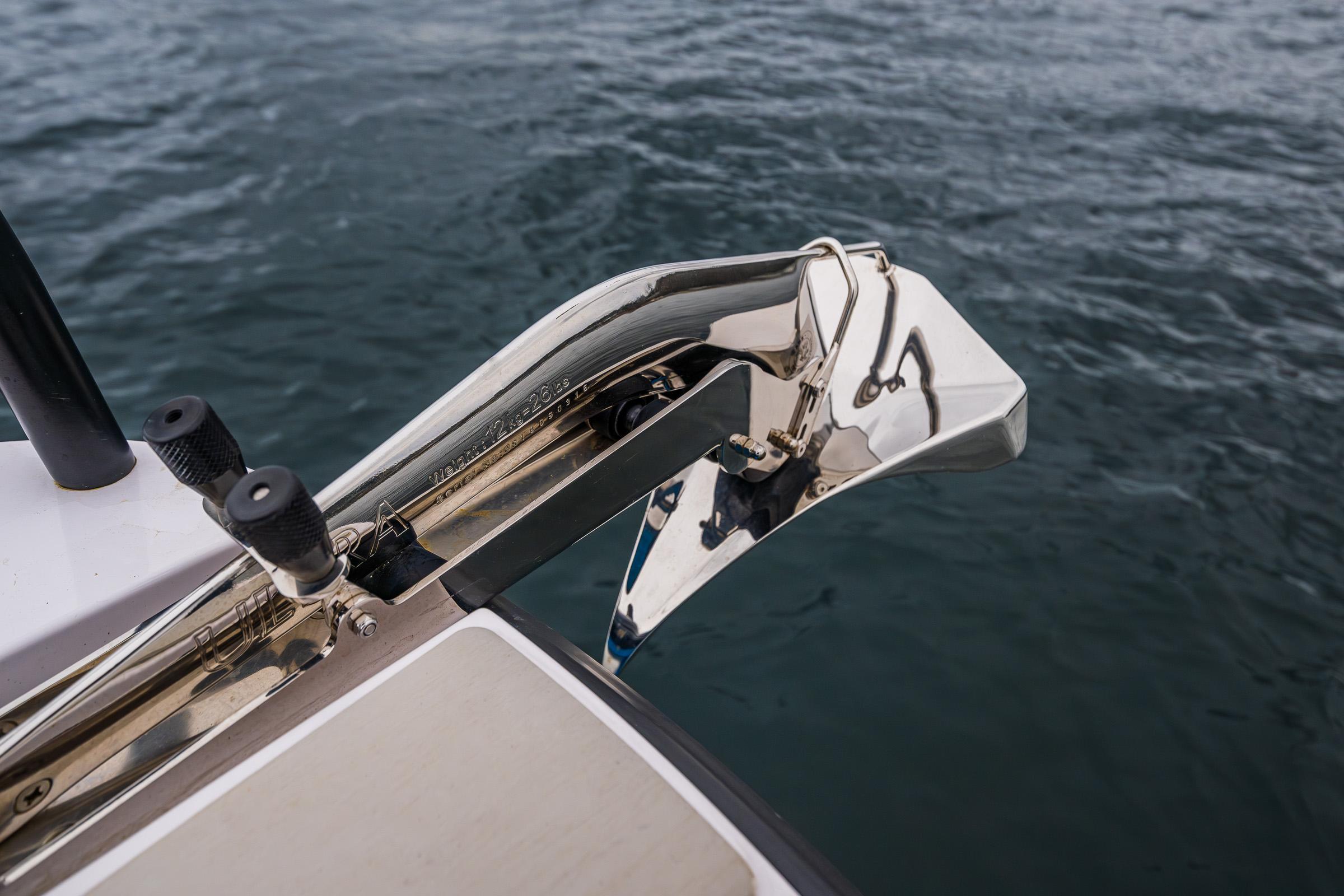 Axopar-37xc  Wetbar 2021-AQVAVIT WA-US-2021 Axopar 37xc Wetbar boat anchor detail over water.-9703795 | Thumbnail