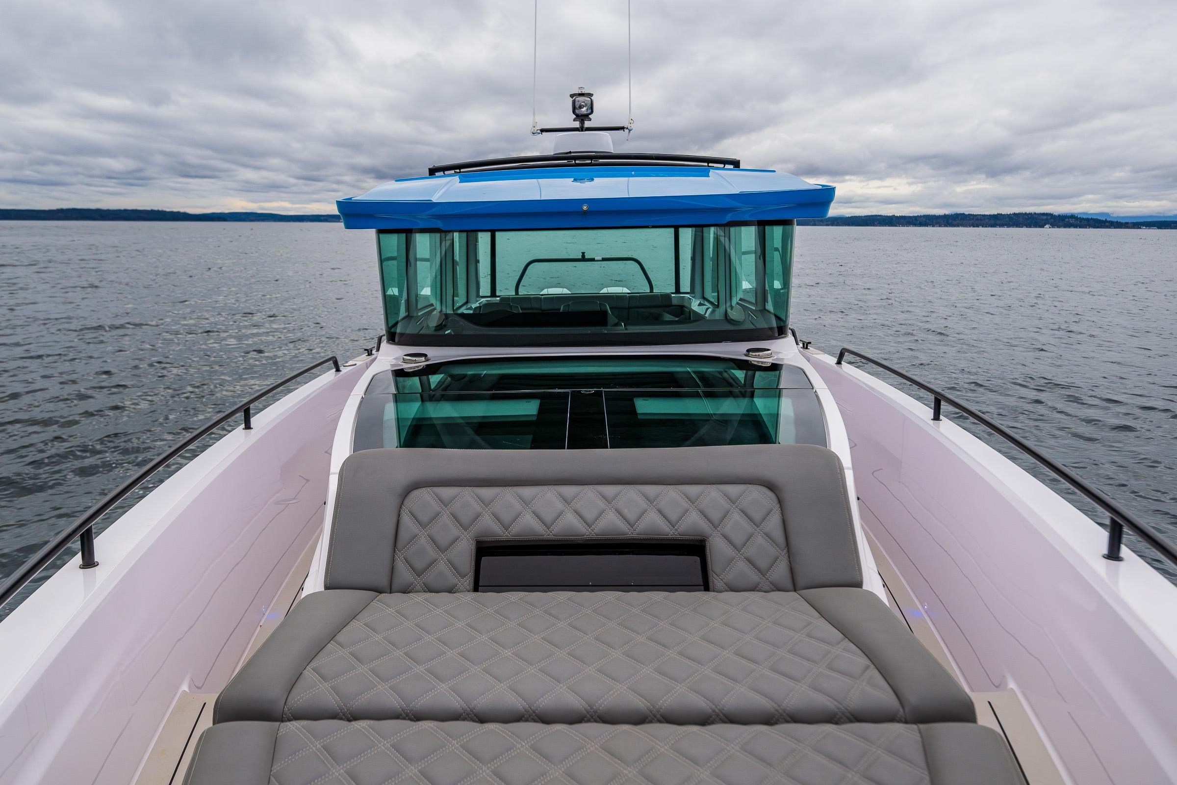 Axopar-37xc  Wetbar 2021-AQVAVIT WA-US-2021 Axopar 37xc Wetbar boat with cushioned seating on open water.-9703795 | Thumbnail