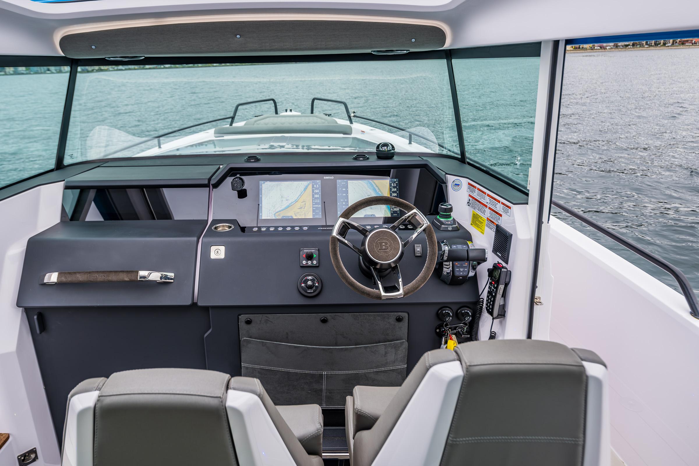Axopar-37xc  Wetbar 2021-AQVAVIT WA-US-2021 Axopar 37xc Wetbar boat cockpit with steering wheel and navigation screens.-9703795 | Thumbnail