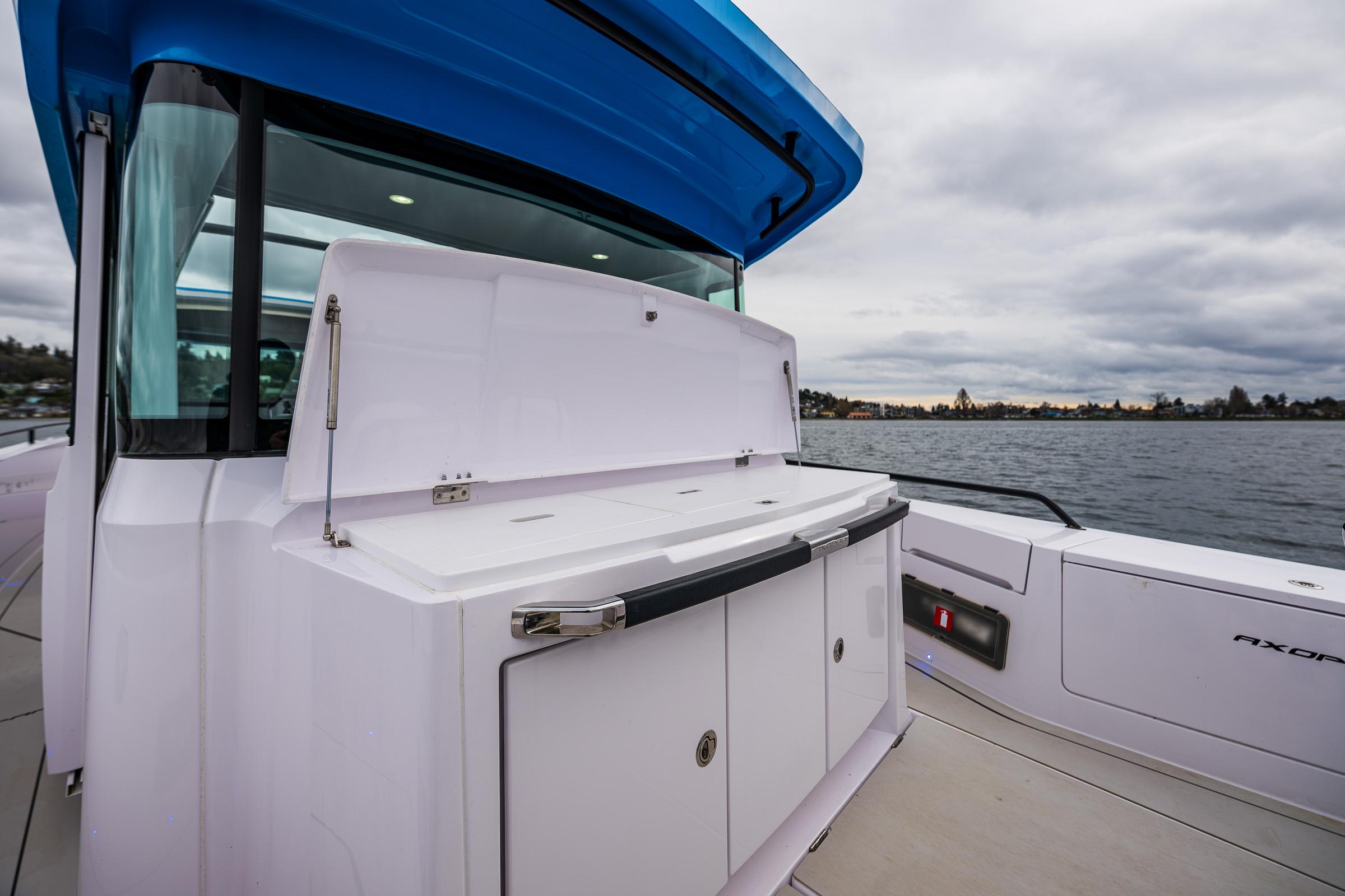Axopar-37xc  Wetbar 2021-AQVAVIT WA-US-2021 Axopar 37xc Wetbar boat with sleek design on a cloudy day.-9703795 | Thumbnail