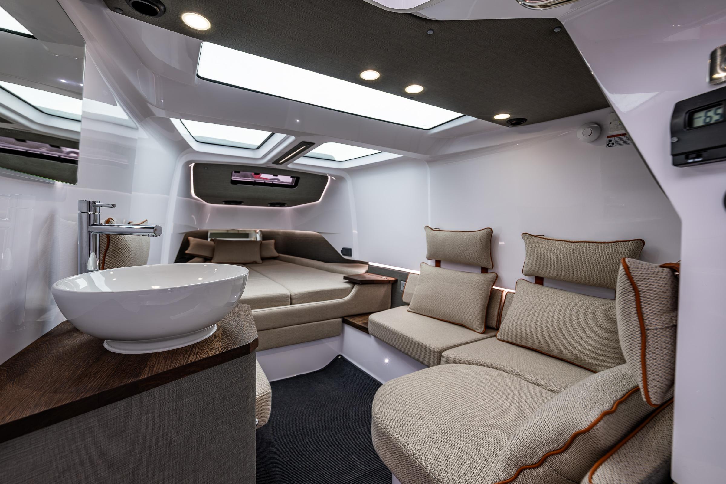 Axopar-37xc  Wetbar 2021-AQVAVIT WA-US-Luxurious interior of 2021 Axopar 37xc Wetbar with modern seating and skylights.-9703795 | Thumbnail