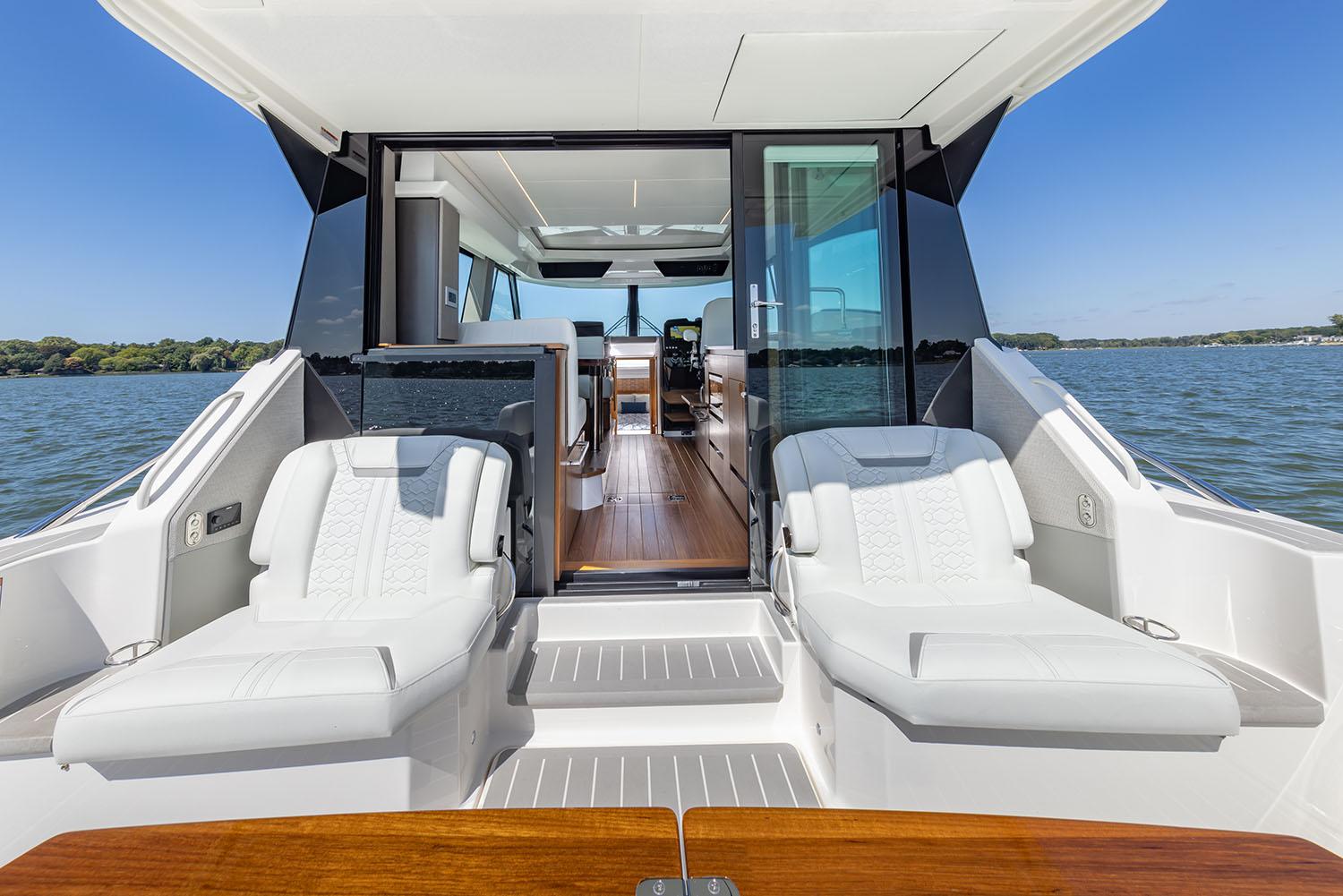 Manufacturer Provided Image: 2025 Tiara Yachts 43 LE luxury yacht with sun loungers and sleek interior design.