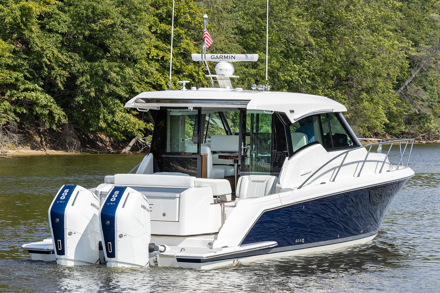Manufacturer Provided Image: 2025 Tiara Yachts 43 LE on water, featuring dual outboard engines and sleek design.