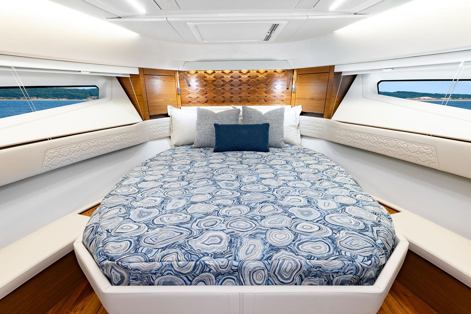 Manufacturer Provided Image: Luxurious 2025 Tiara Yachts 43 LE cabin interior with elegant bedding and modern design.