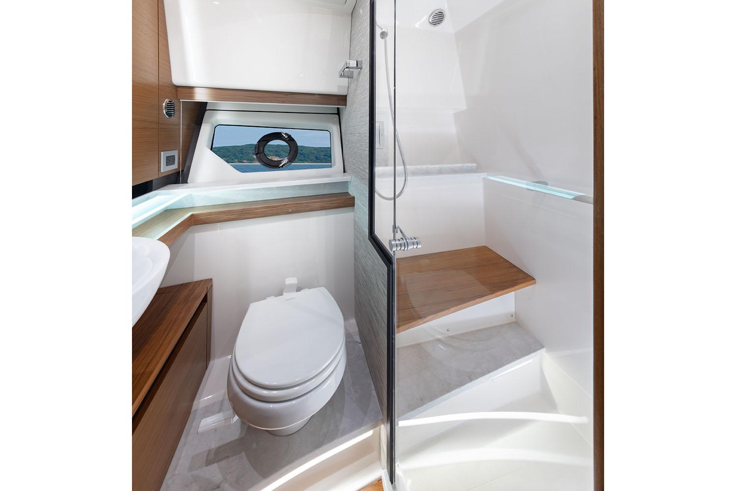Manufacturer Provided Image: Luxurious bathroom in 2025 Tiara Yachts 43 LE, featuring modern fixtures and ocean view.