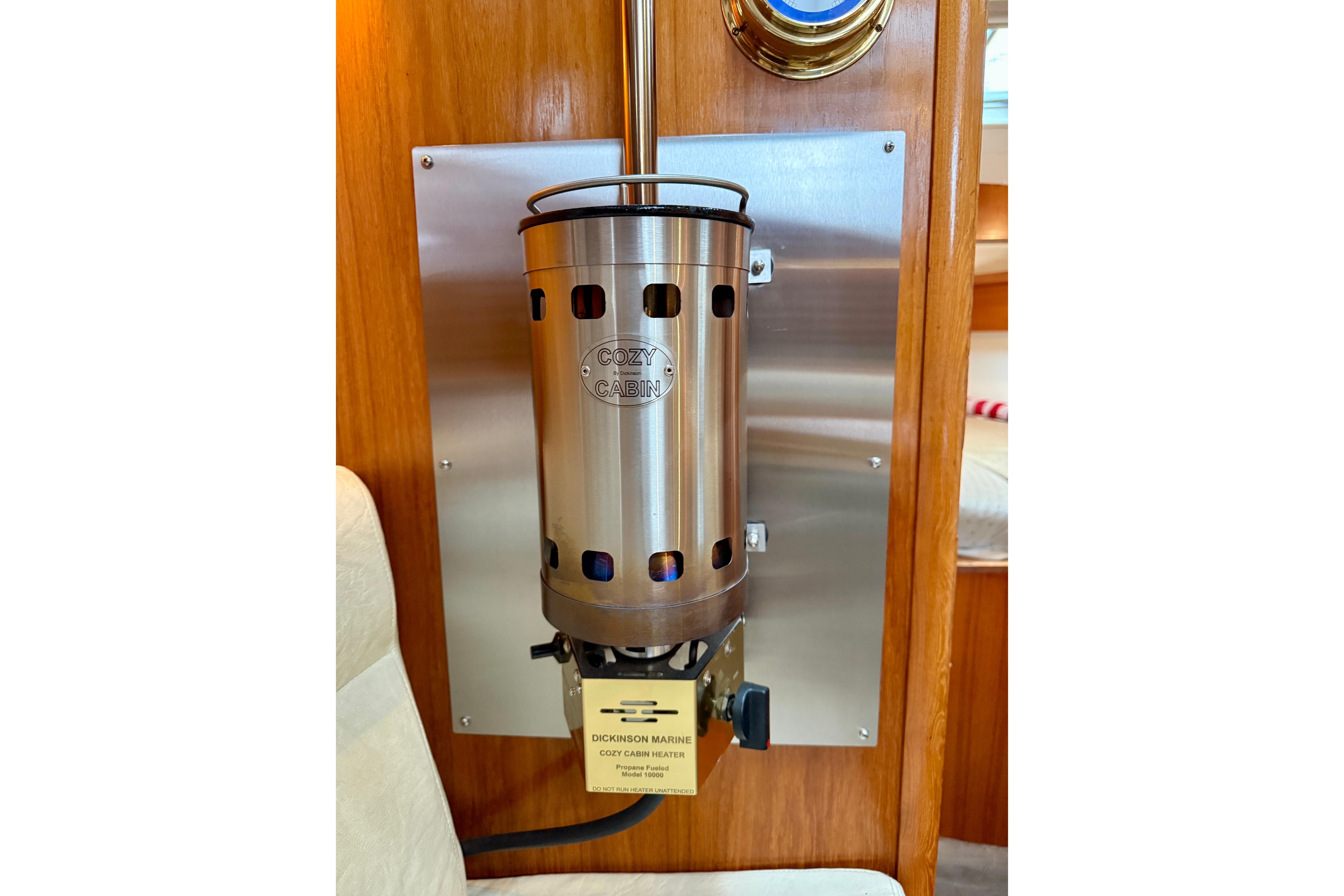 Cozy cabin heater inside 1997 Jeanneau Sun Odyssey 36.2 sailboat interior.
