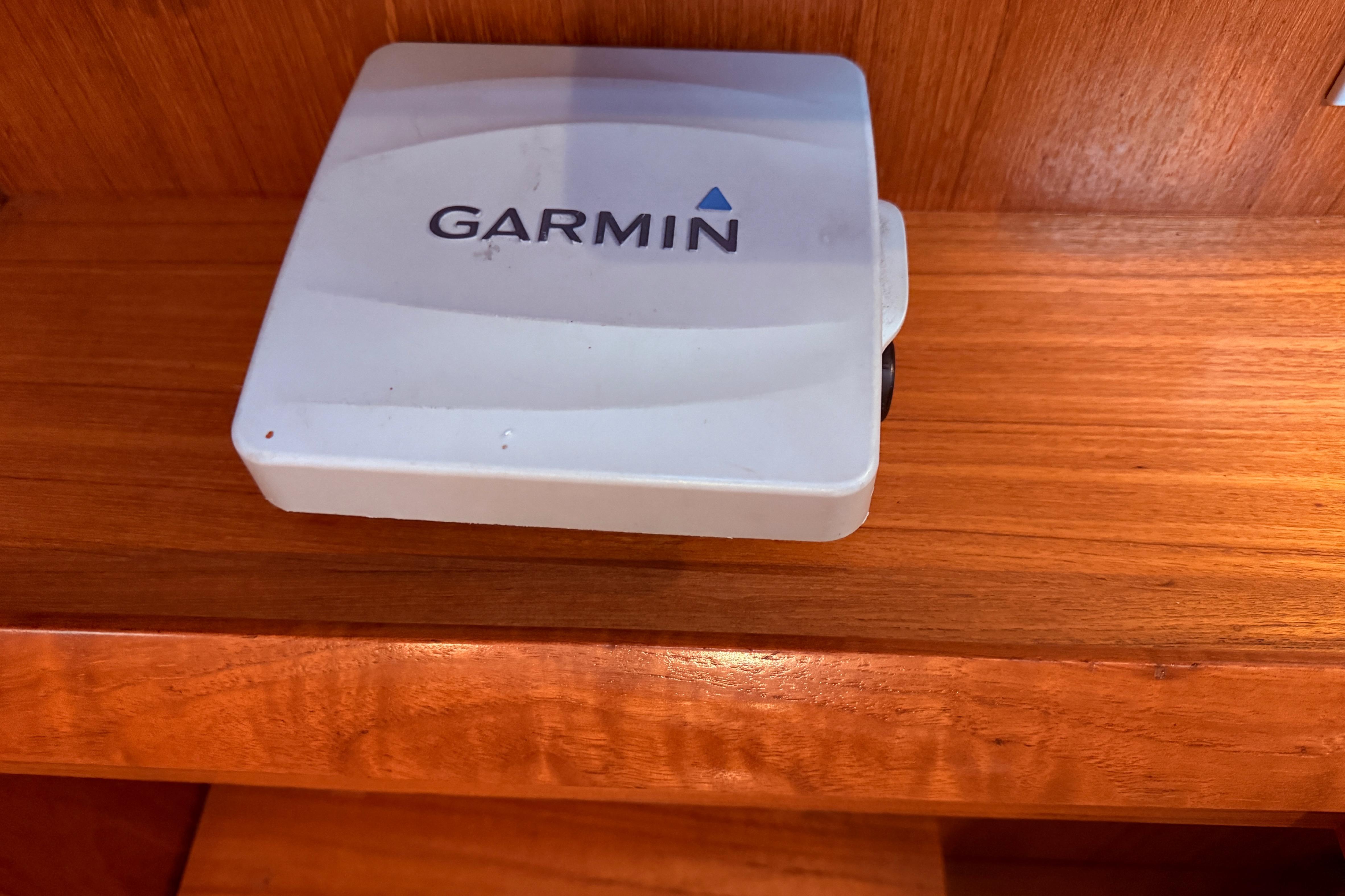 Garmin device on Jeanneau Sun Odyssey 36.2 yacht, 1997 model, wooden interior.