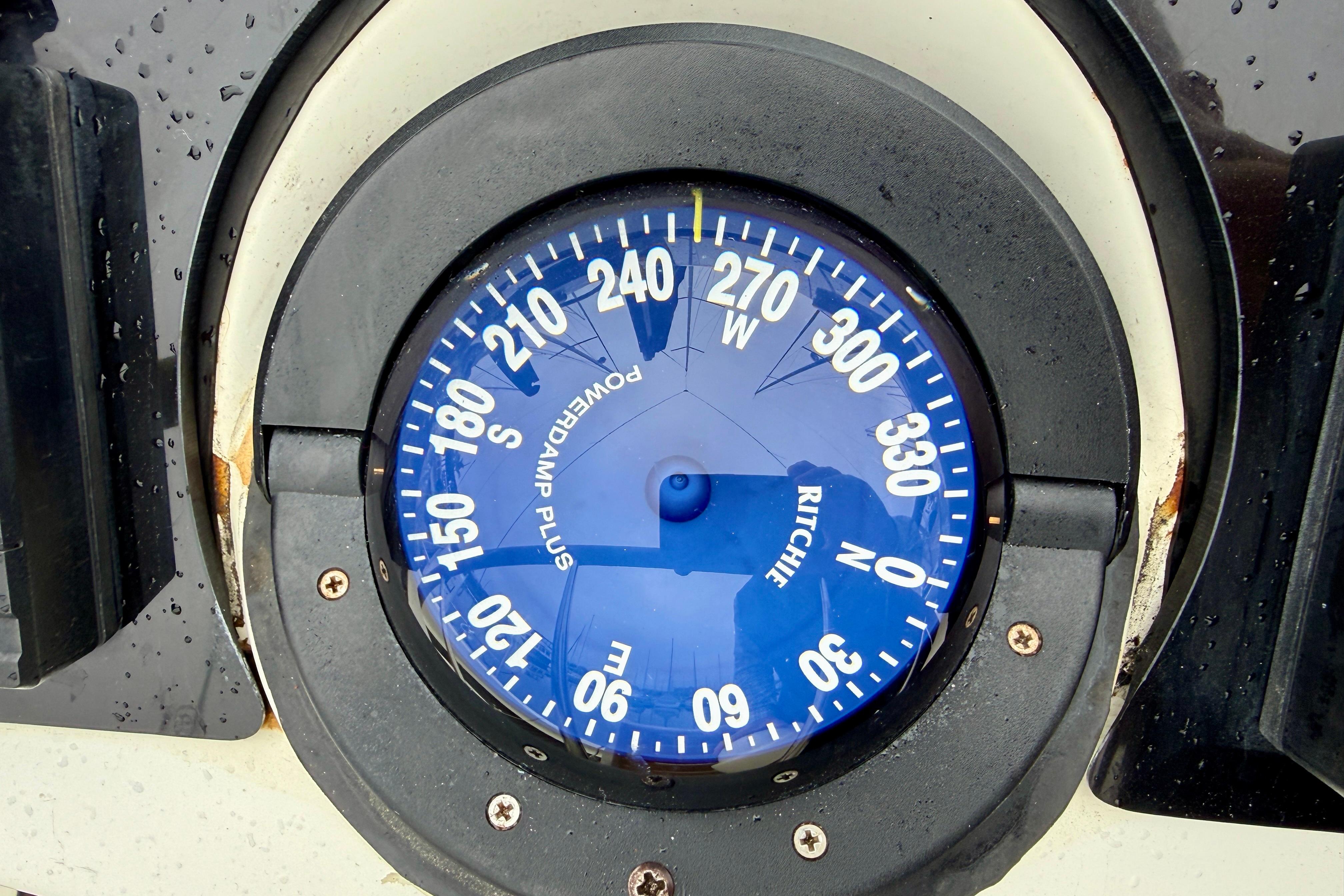 Compass on Jeanneau Sun Odyssey 36.2 yacht, 1997 model, showing a westward direction.