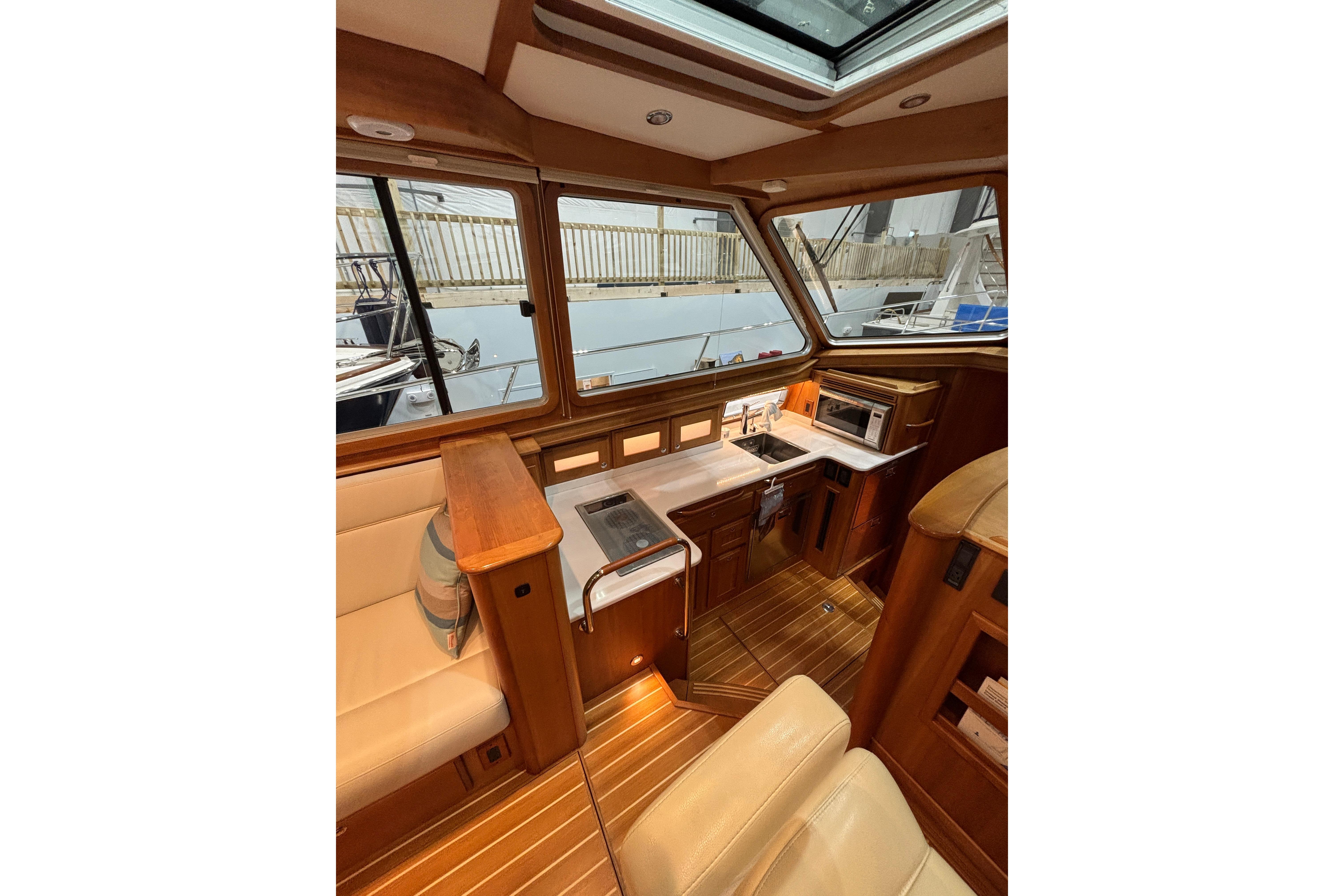 Interior of 2020 Sabre 45 Salon Express yacht with wood finish and modern amenities.