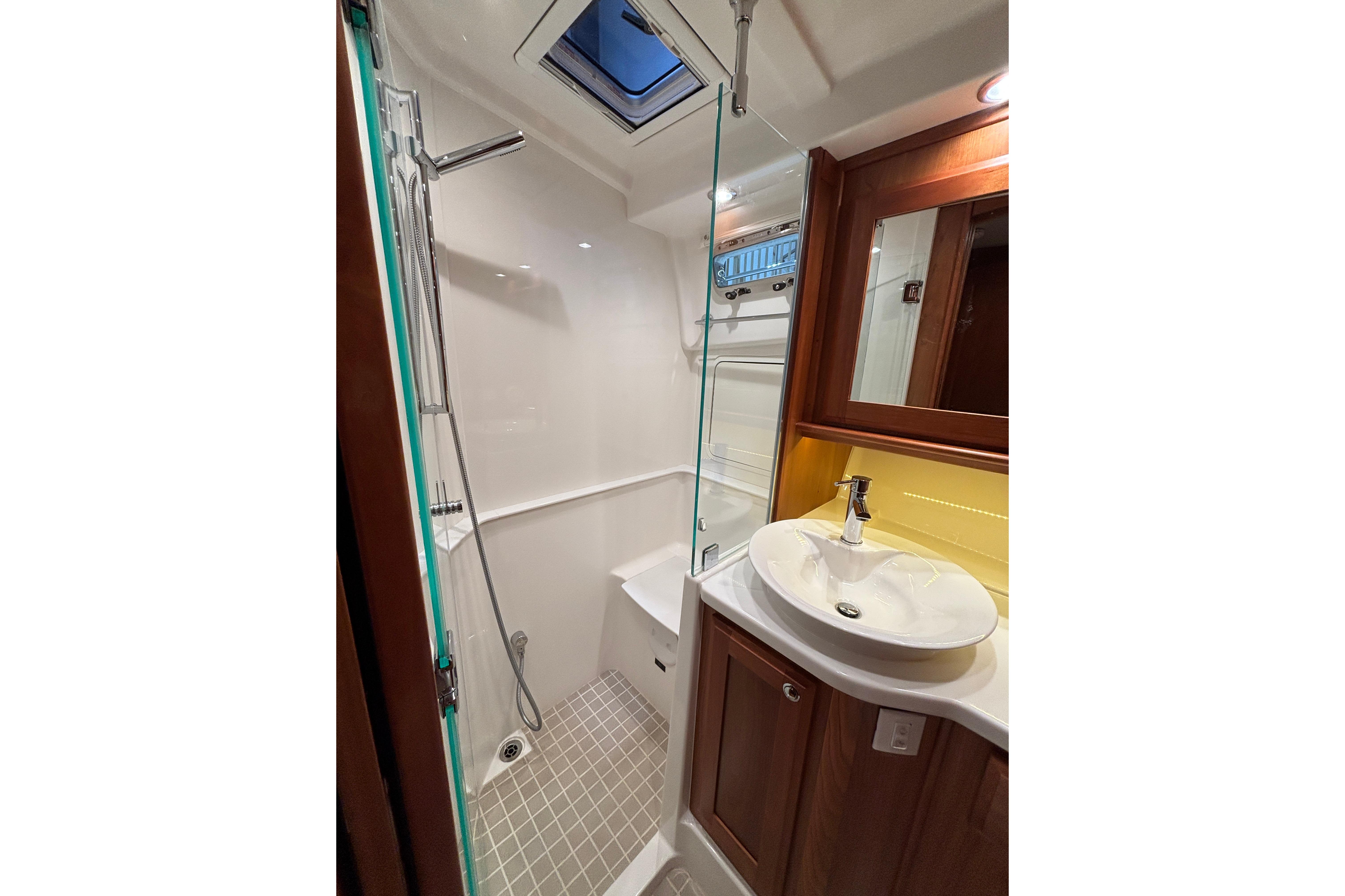 Luxurious bathroom in 2020 Sabre 45 Salon Express yacht with modern fixtures.