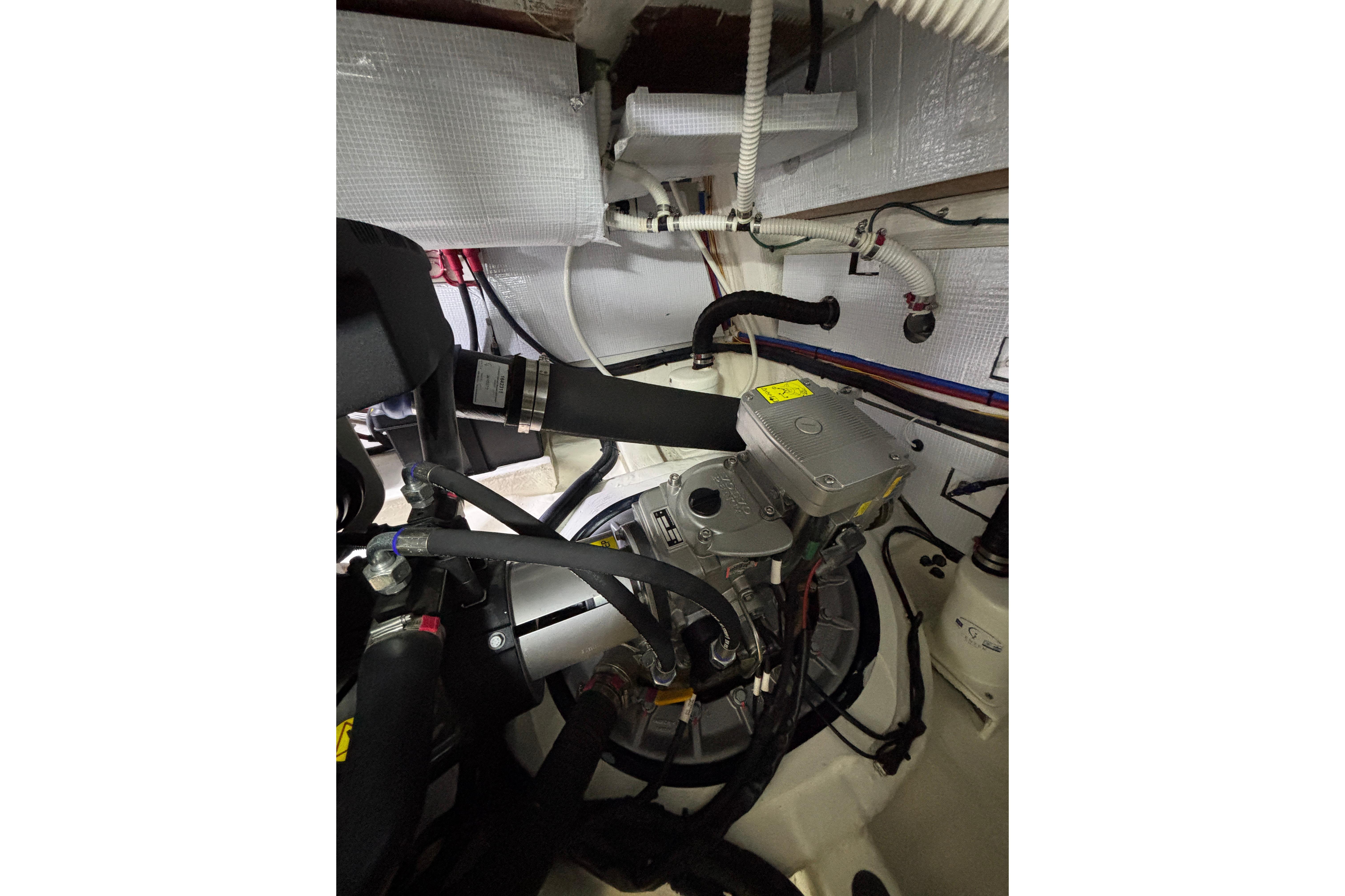 Engine room of 2020 Sabre 45 Salon Express with visible mechanical components.