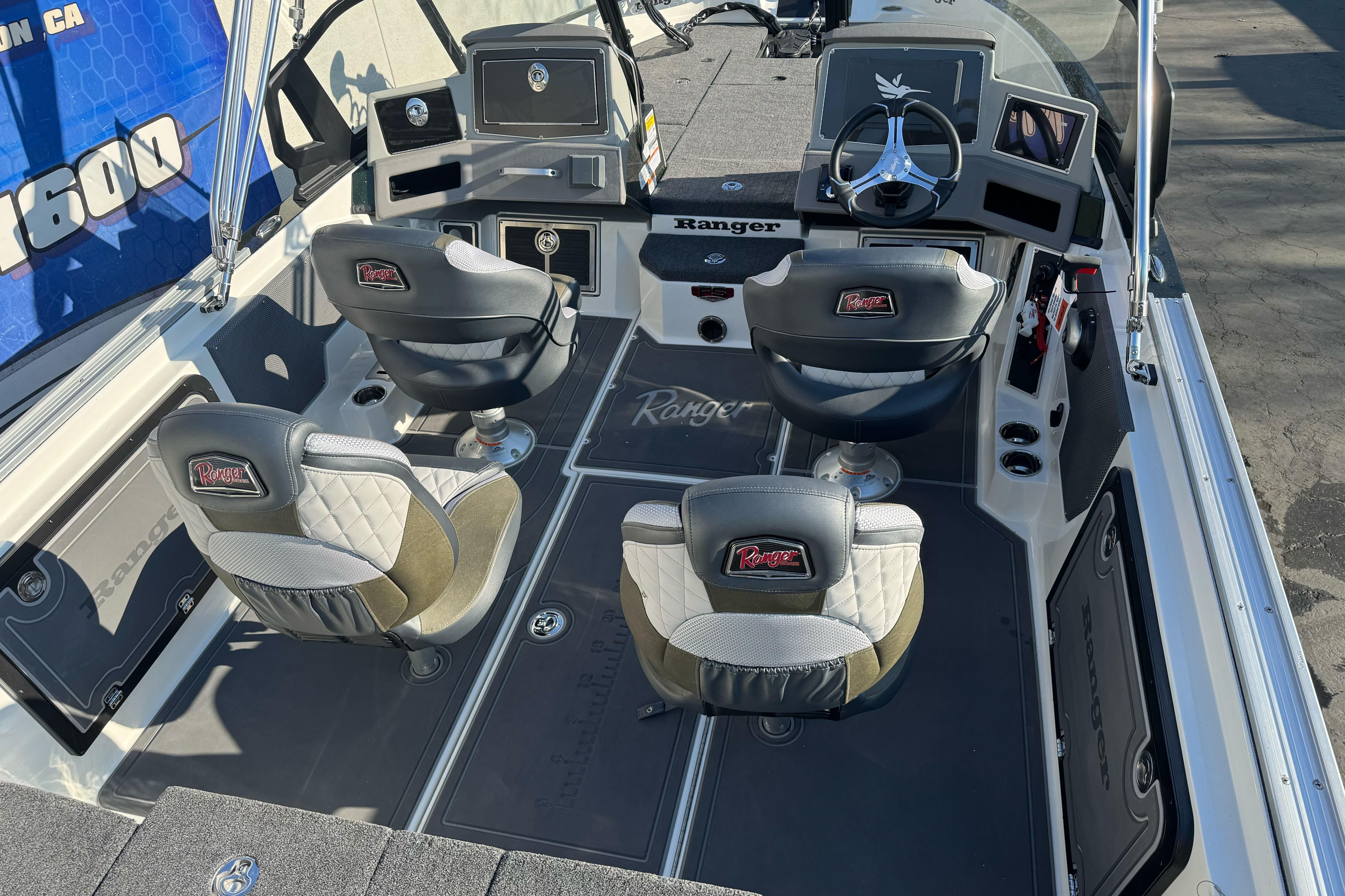 2026 Ranger 620xFS Pro boat interior with four seats and modern dashboard.